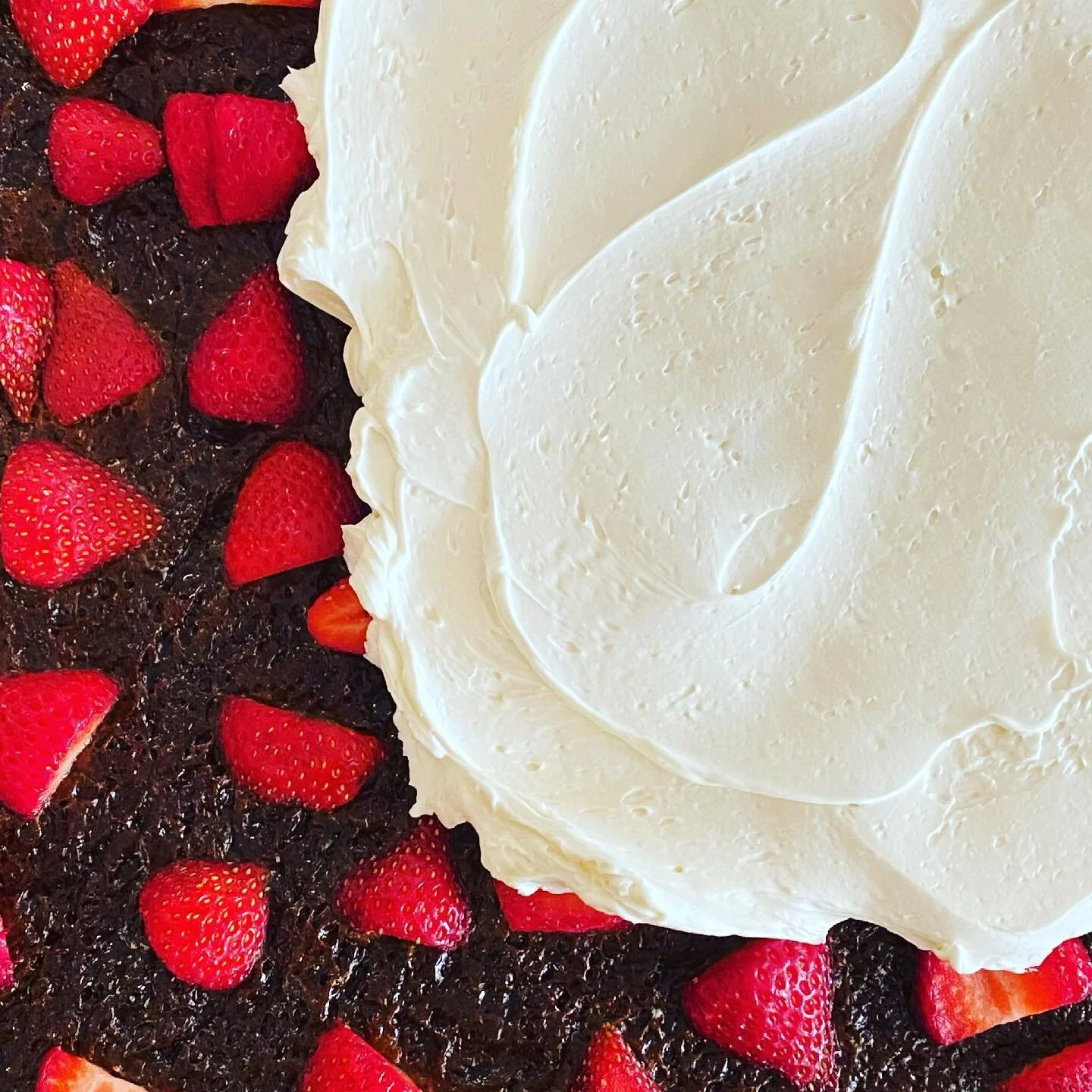 Ginger cake with fresh strawberries and vanilla malt buttercream.