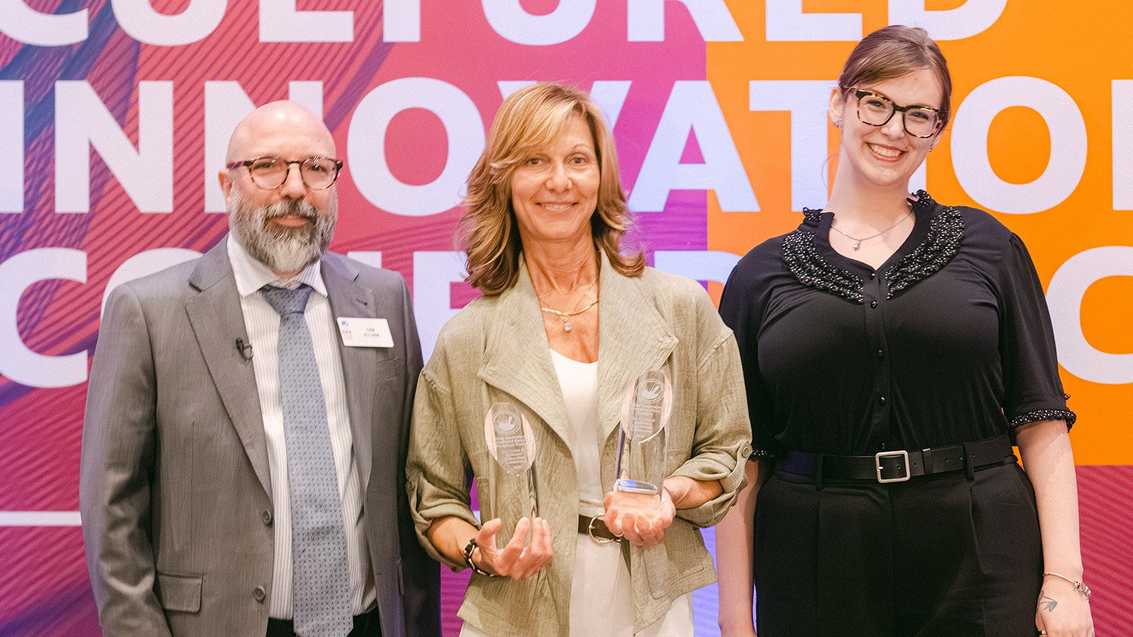 Fruitcrown's Michelle Le Goues accepts two First Place awards at the 2026 IDFA Innovative Flavors and Products Awards
