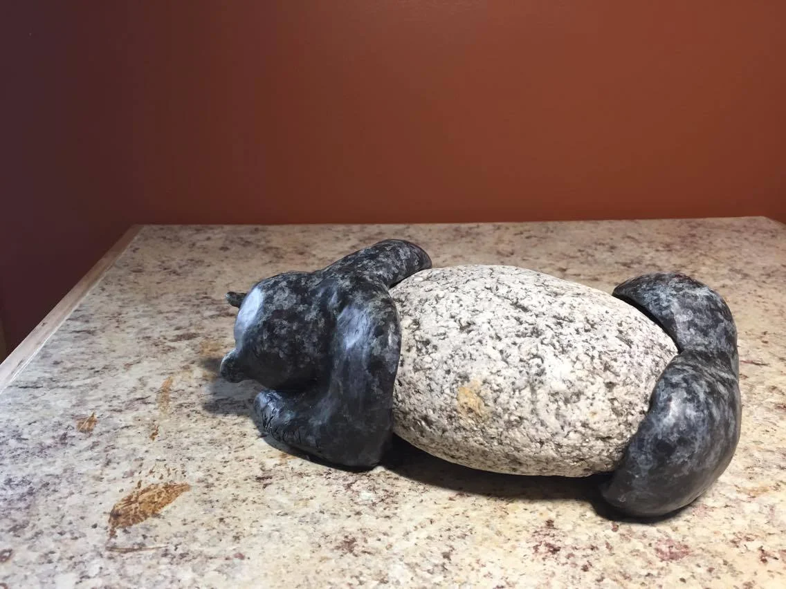 Lazy Hearts Year: 2017 Edition: 1 Size: 3 x 8.5 x 4.5 (h x w x d, inches) Geo Bears are hybrids mixing my favourite elements of stone and bronze to create unique, one of a kind sculptures.Lazy Hearts is a fat sleepy bear, round and curvy, ready to sleep off the long cold winter.