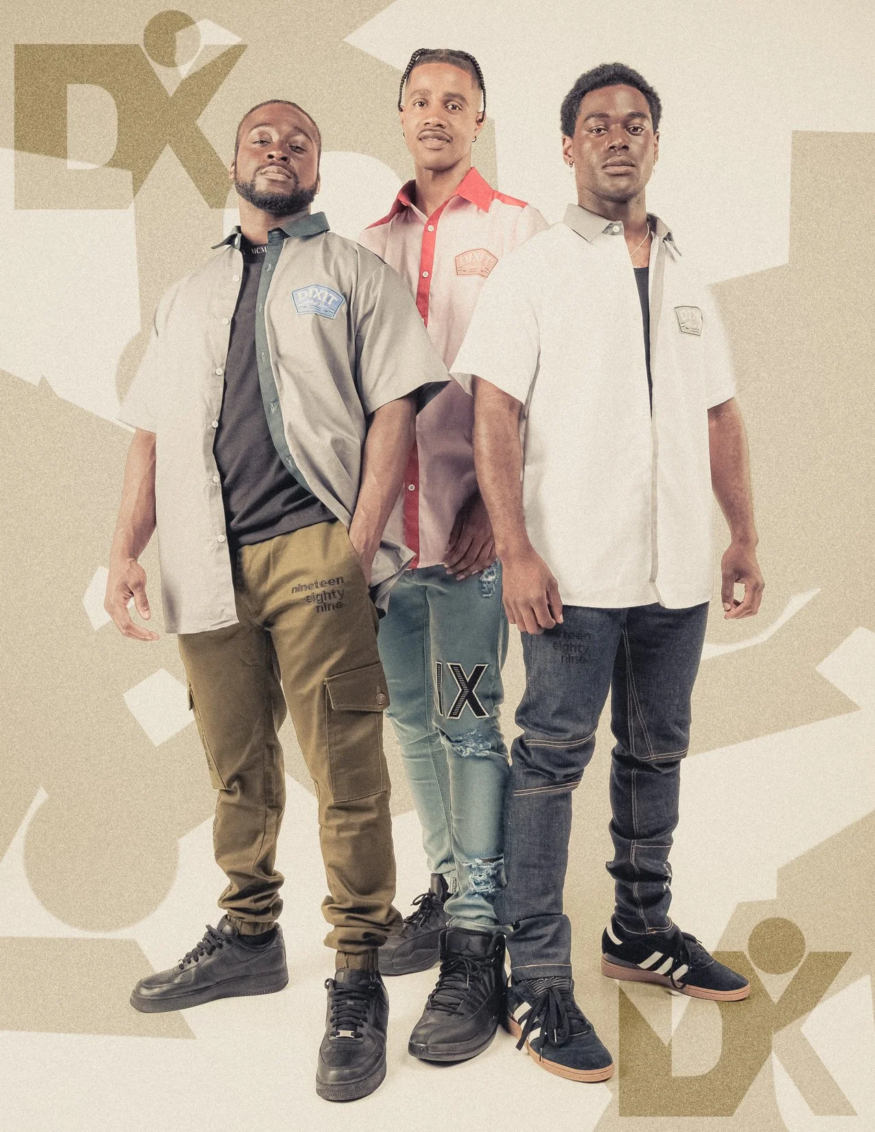 Three young men standing together against a beige background with abstract shapes, wearing casual outfits with DX shirt patches.