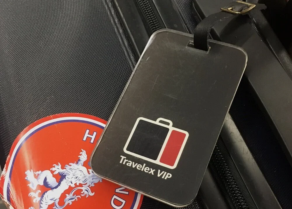 travelex-logo-suitcase-christina-d'angelo-graphic-designer-new-york-.webp