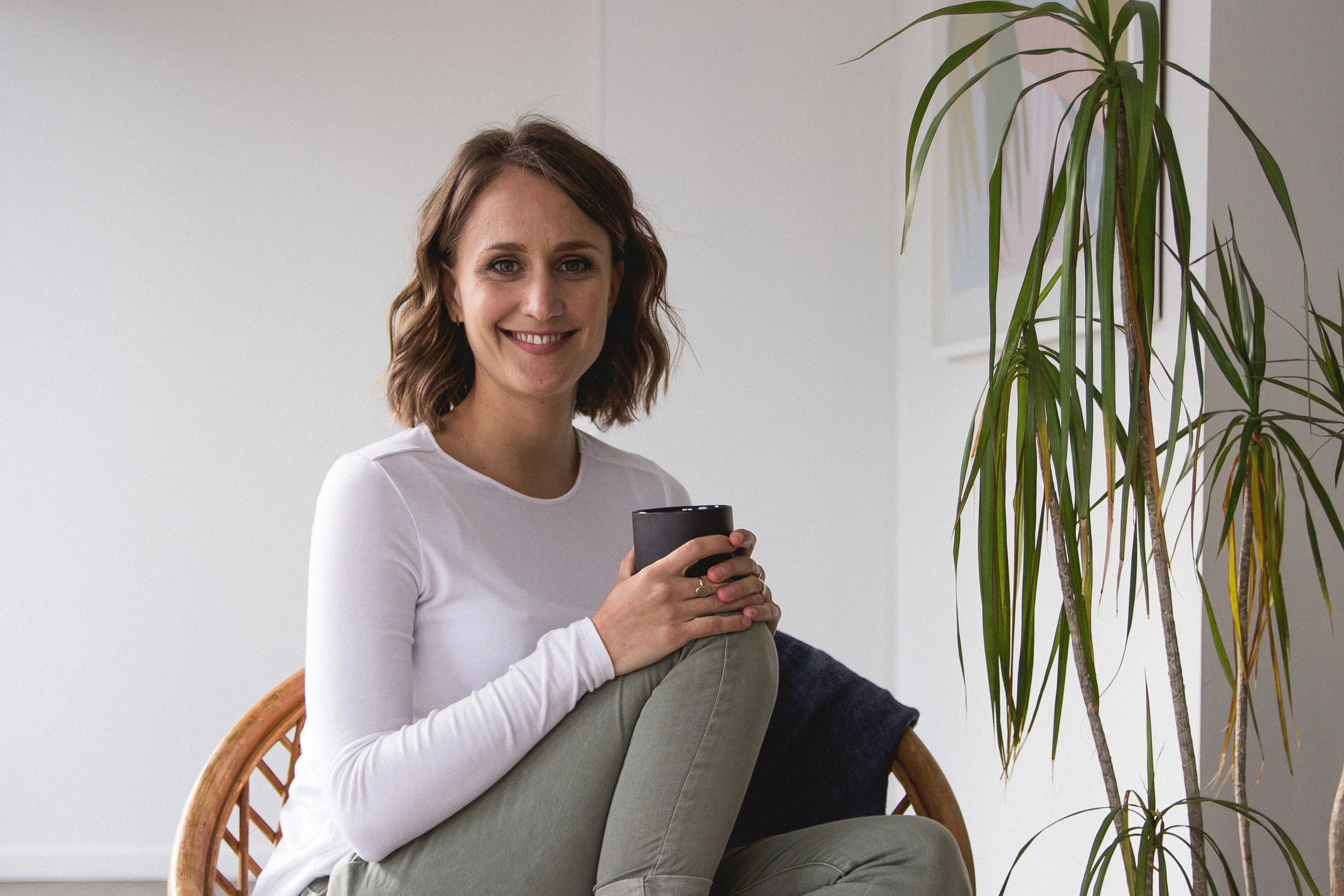 Em curled up on chair.jpg