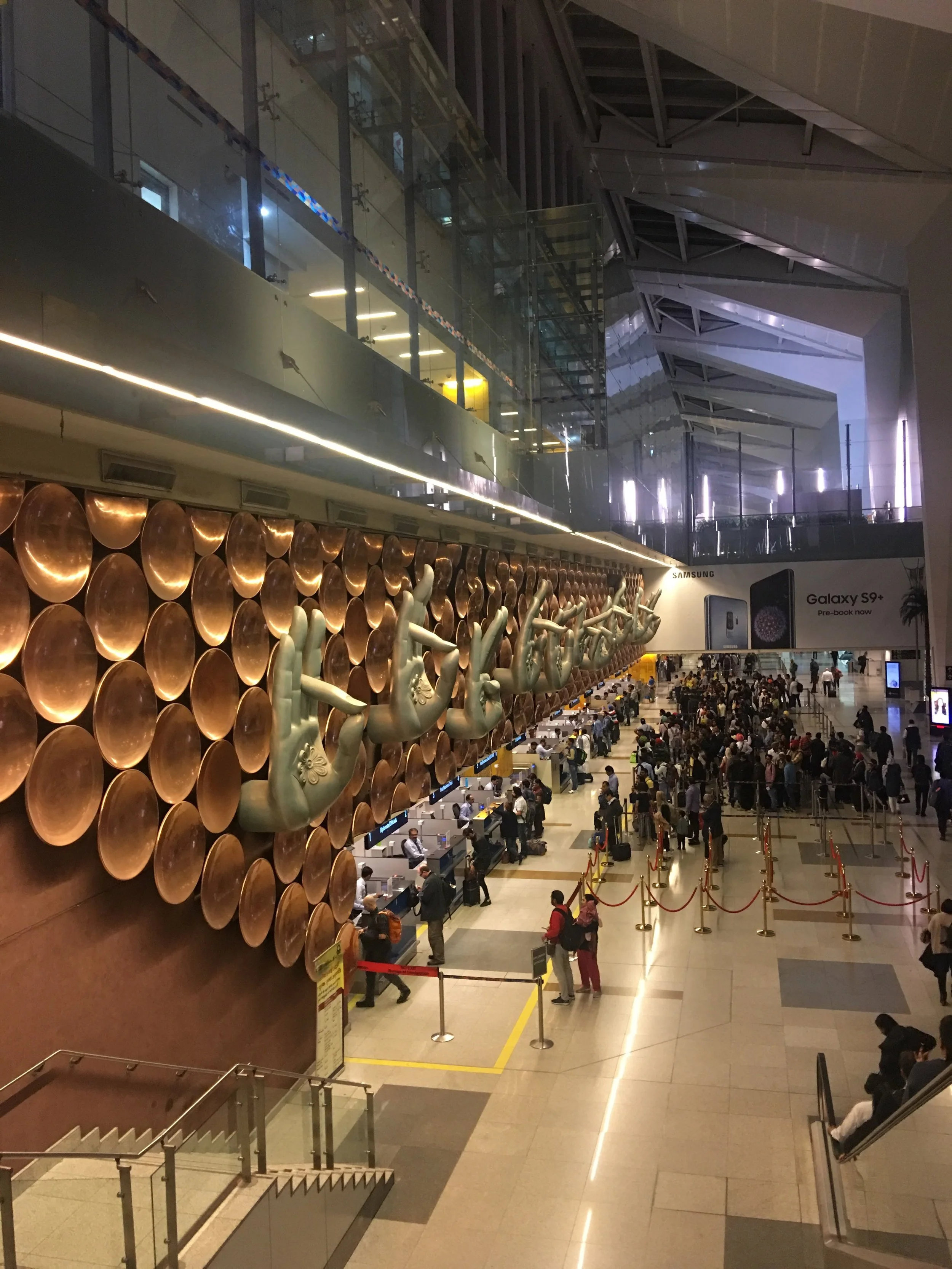 Mudras (hand symbols) welcoming us at the Delhi airport.