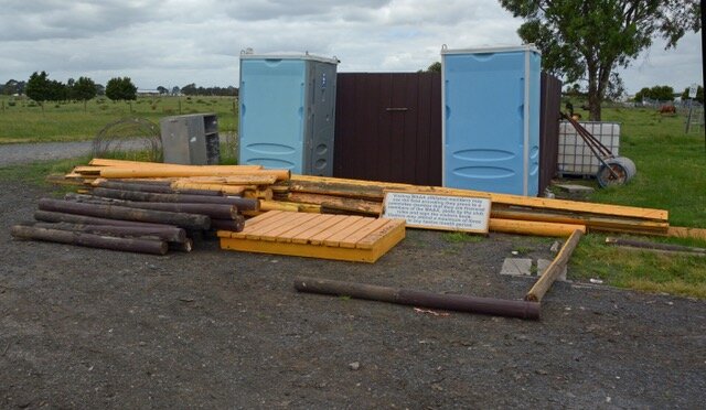  8/11   Fence posts and capping stacked for removal 