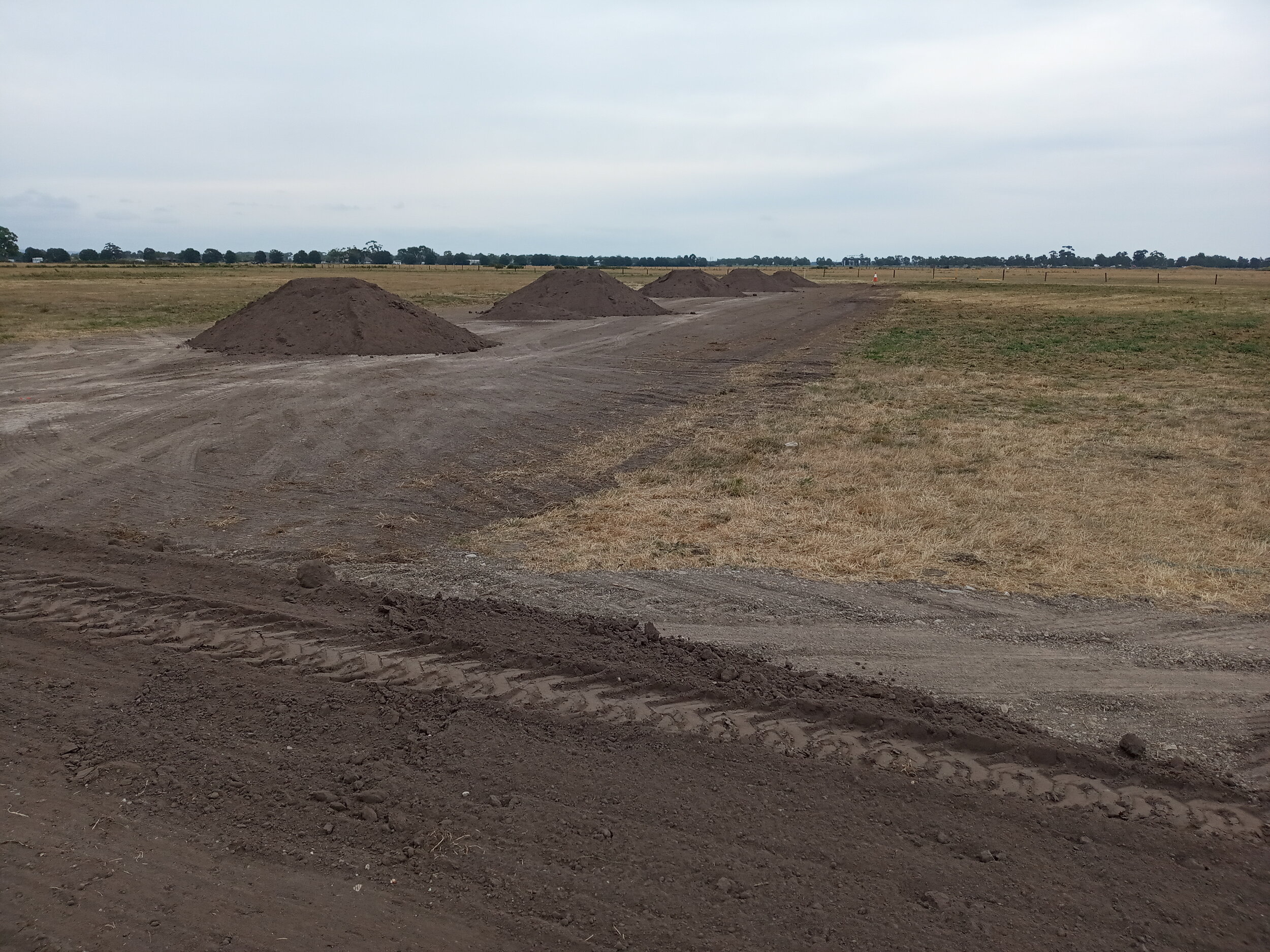  27/2  More topsoil to be spread over the EW runway at the west end 