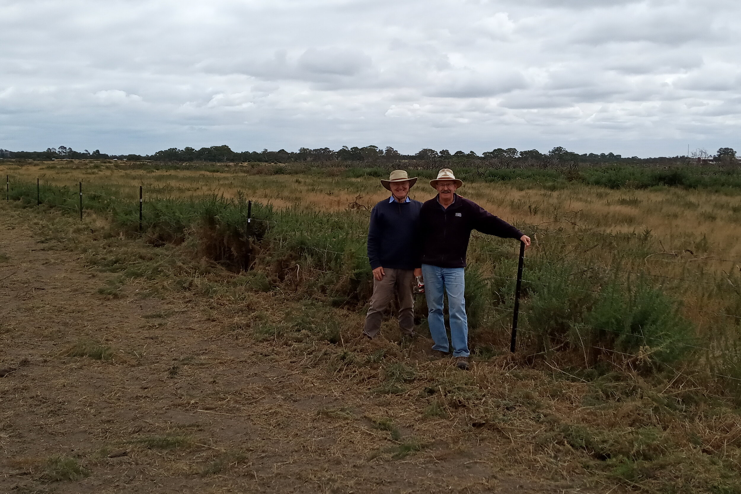  4/3  Geoff and David looking pleased and feeling like the cows are no longer a threat to the precious runways so long in the making 