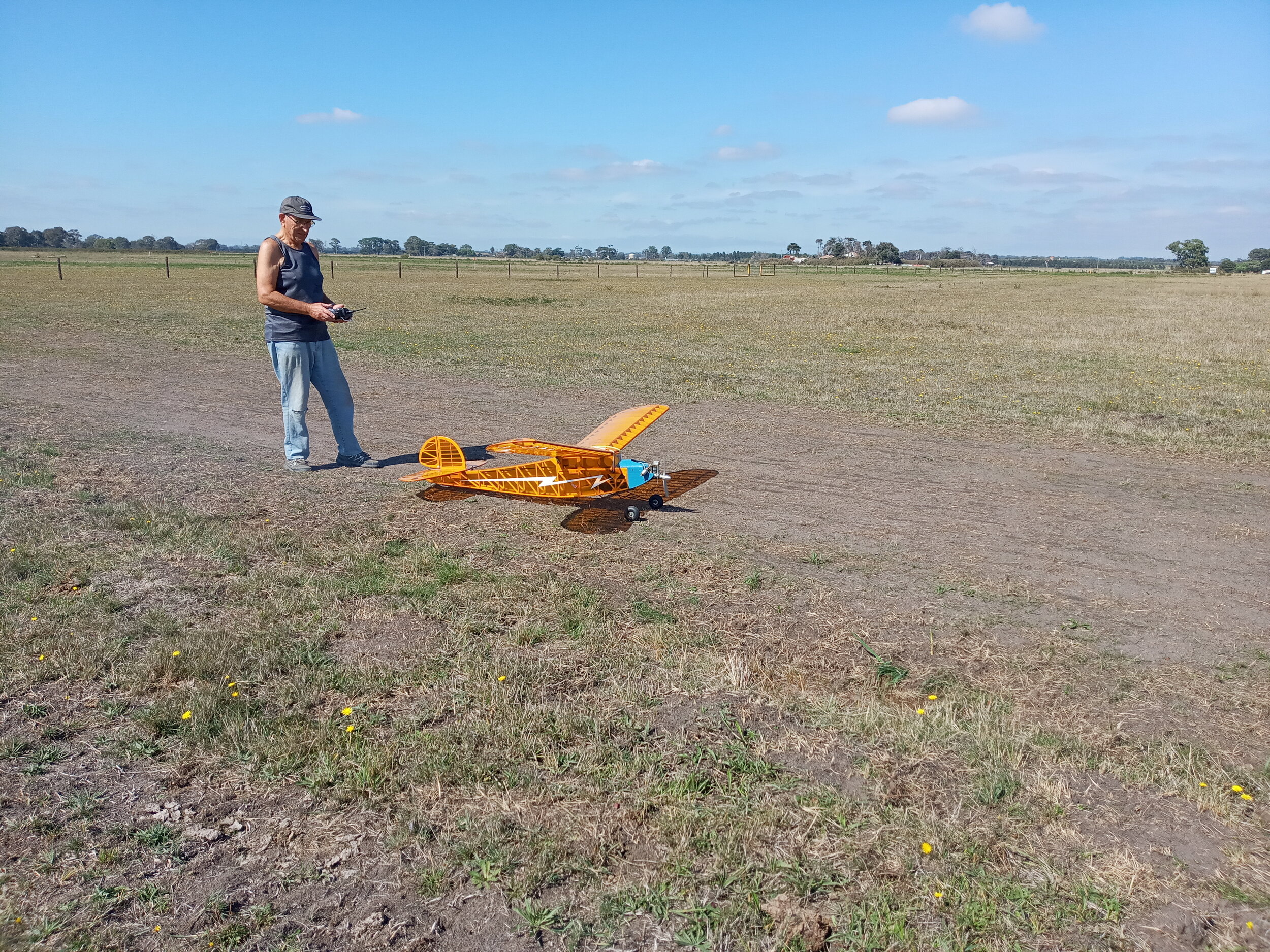  31/3  Dino flies his scratch built Old Timer from Rod’s temporary runway at MX. 