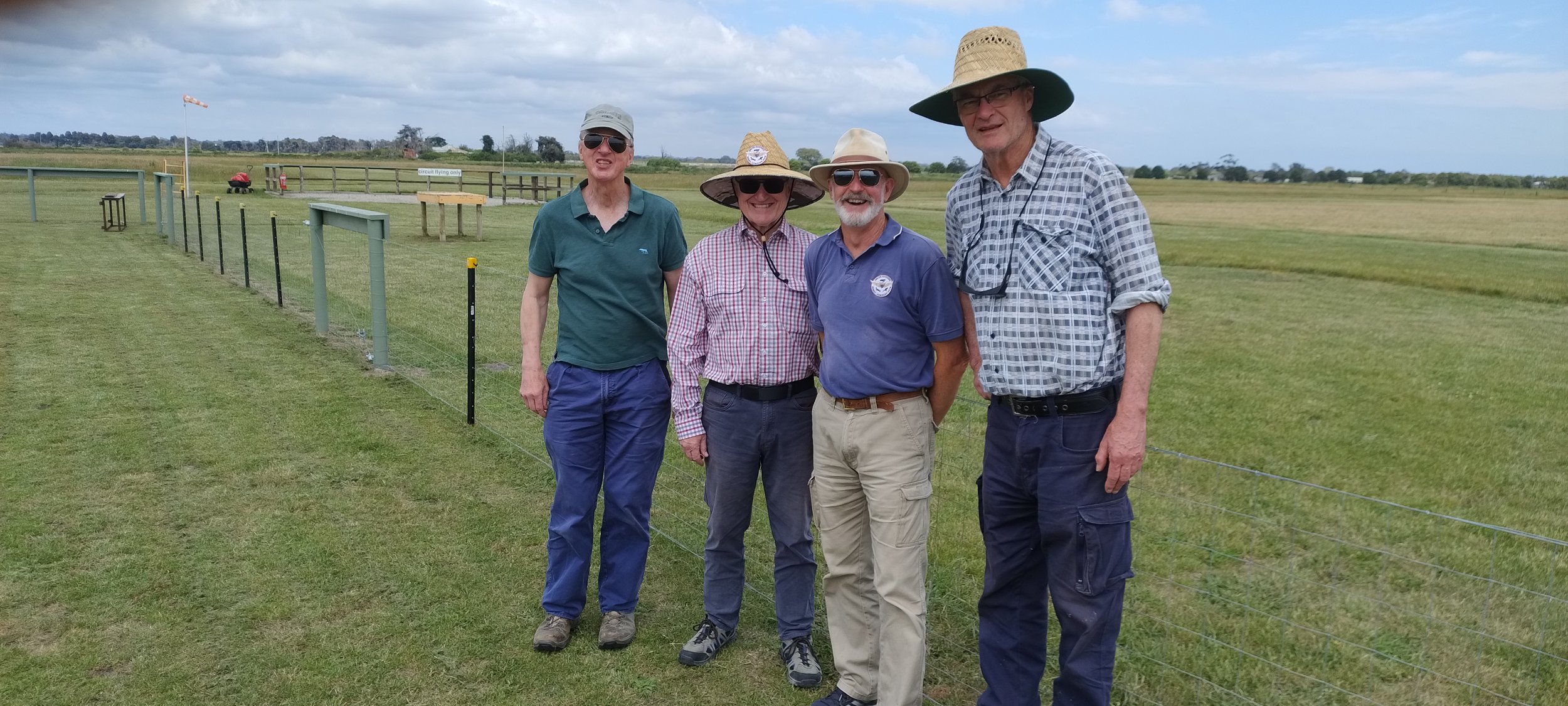  Chris C, Geoff M, David W, and Bill S beside the final  section of safety fence completed 23 Nov - 28/11/2023 