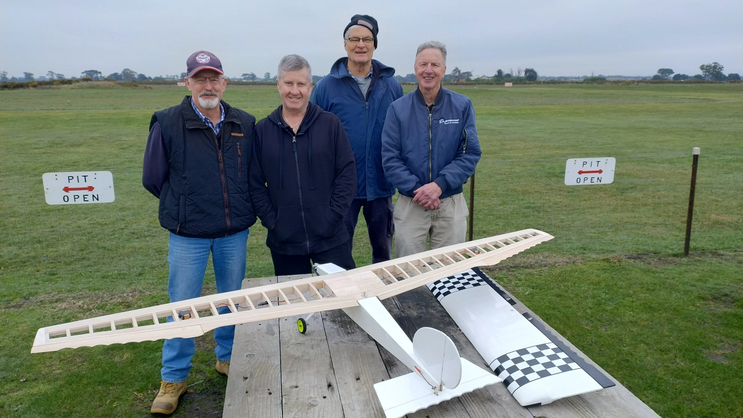  31/07/2026 - David W, Dale L, Bill S, and Chris C admire Dale’s ingenuity. 