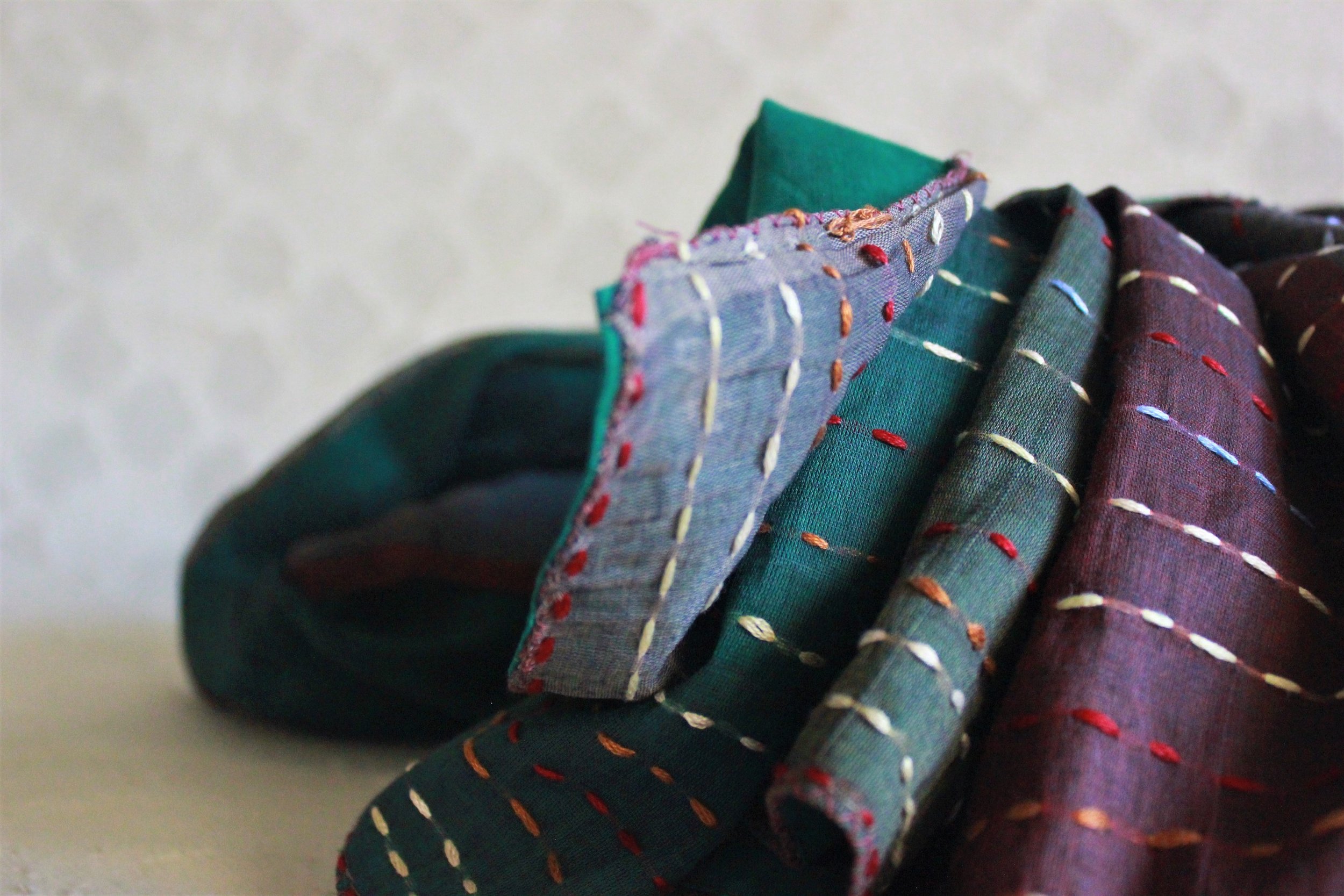 Accidentally burnt sari scrap -- multi-colour kantha threadwork.JPG
