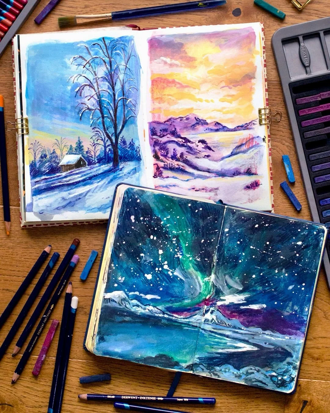 Ad Have you ever prepped your pages with Derwent Inktense before? They work perfectly as a base layer when applied with water as they dry permanently - which meant it was absolutely perfect for layering on top for these winter landscapes! 😍❄️

We ha