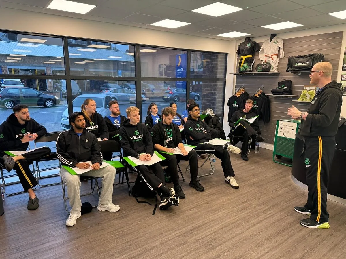 At Premier Kickboxing, we believe something powerful:

Earning a black belt shows you can do martial arts.
Instructor training shows you can teach it.

They are two completely different skill sets.

A black belt represents years of discipline, practi