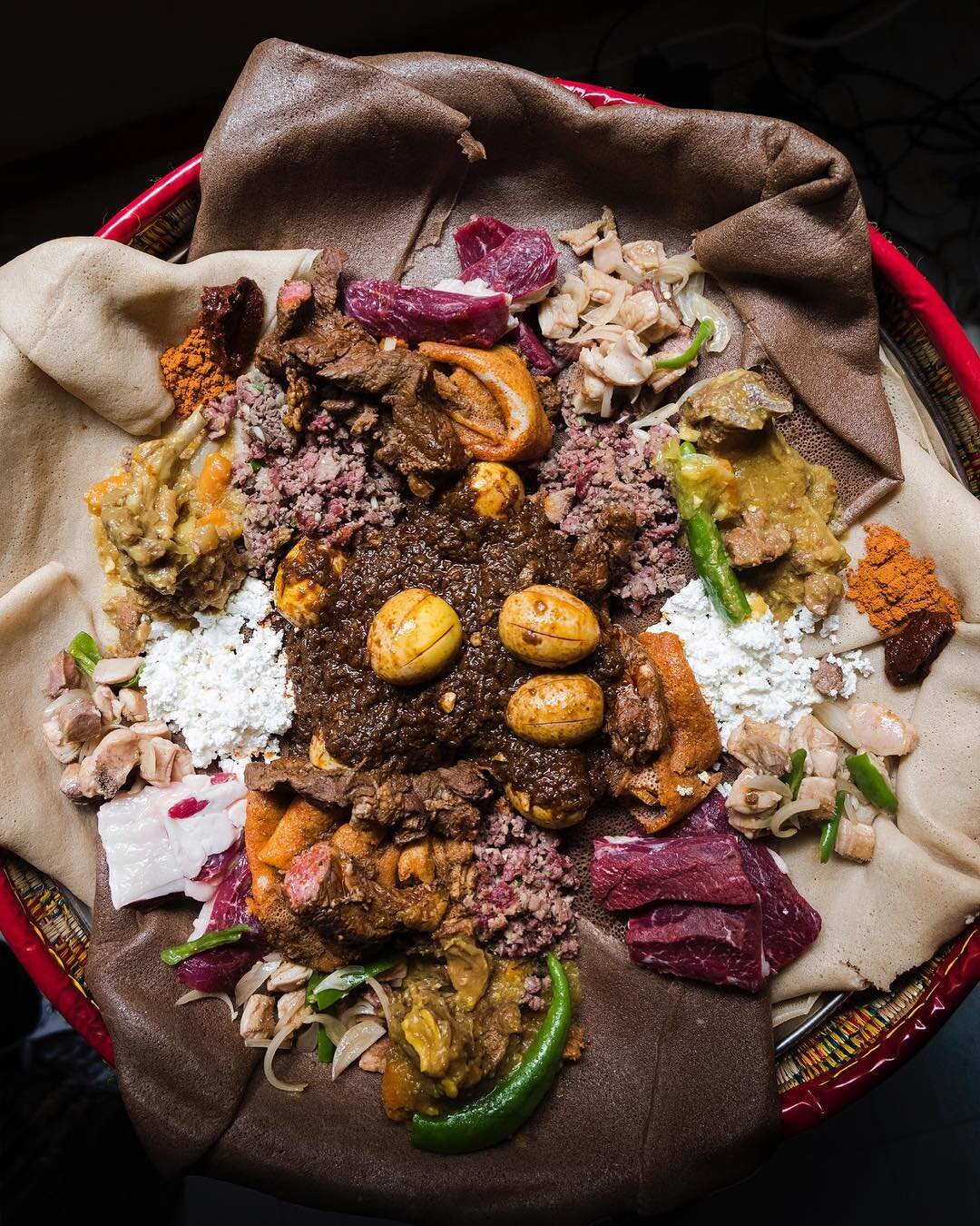 Last year @chef_yohanis invited us into his family&rsquo;s home in Addis Ababa to cook and enjoy a traditional Ethiopian Easter feast. Check out the full story in the latest issue of @saveurmag