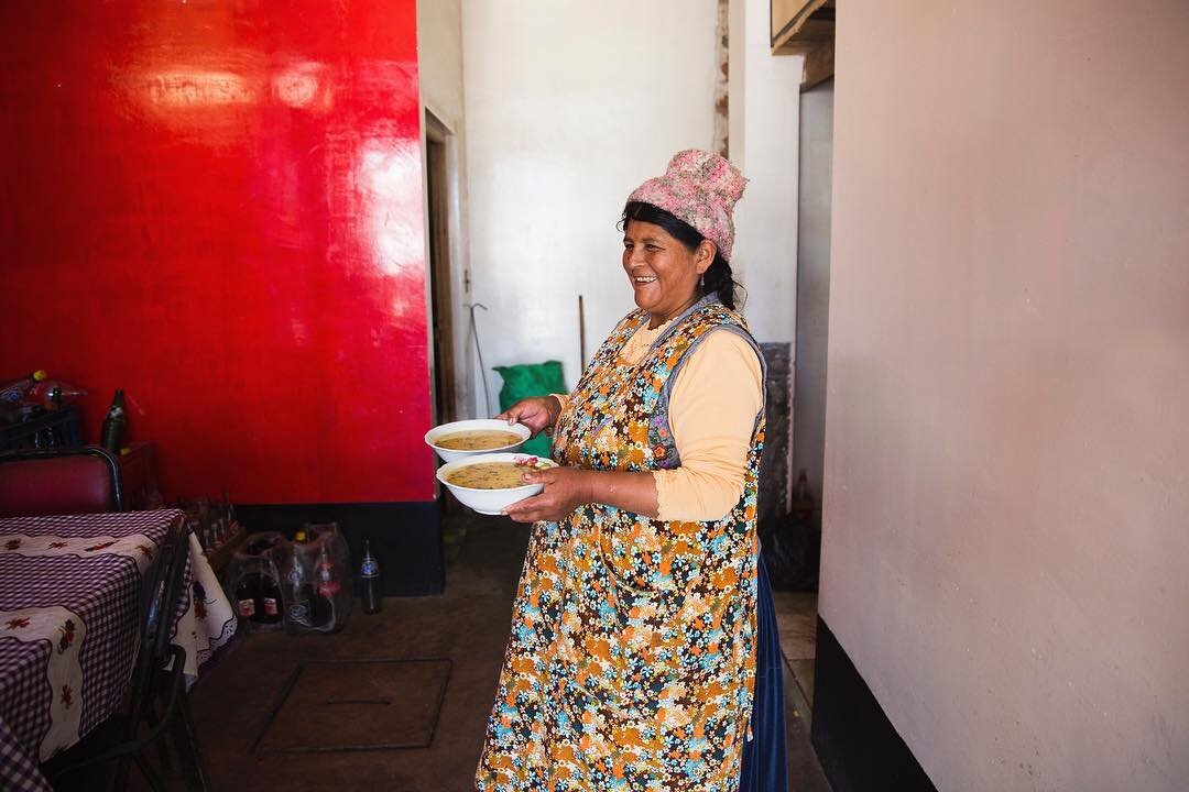 This summer @lesliepariseau and I spent a week in Bolivia meeting, eating, and cooking with some of the country&rsquo;s most inspiring women. Pictured here is Fortunata serving her favored sopa de arroz for lunch. Check out the latest issue of @saveu