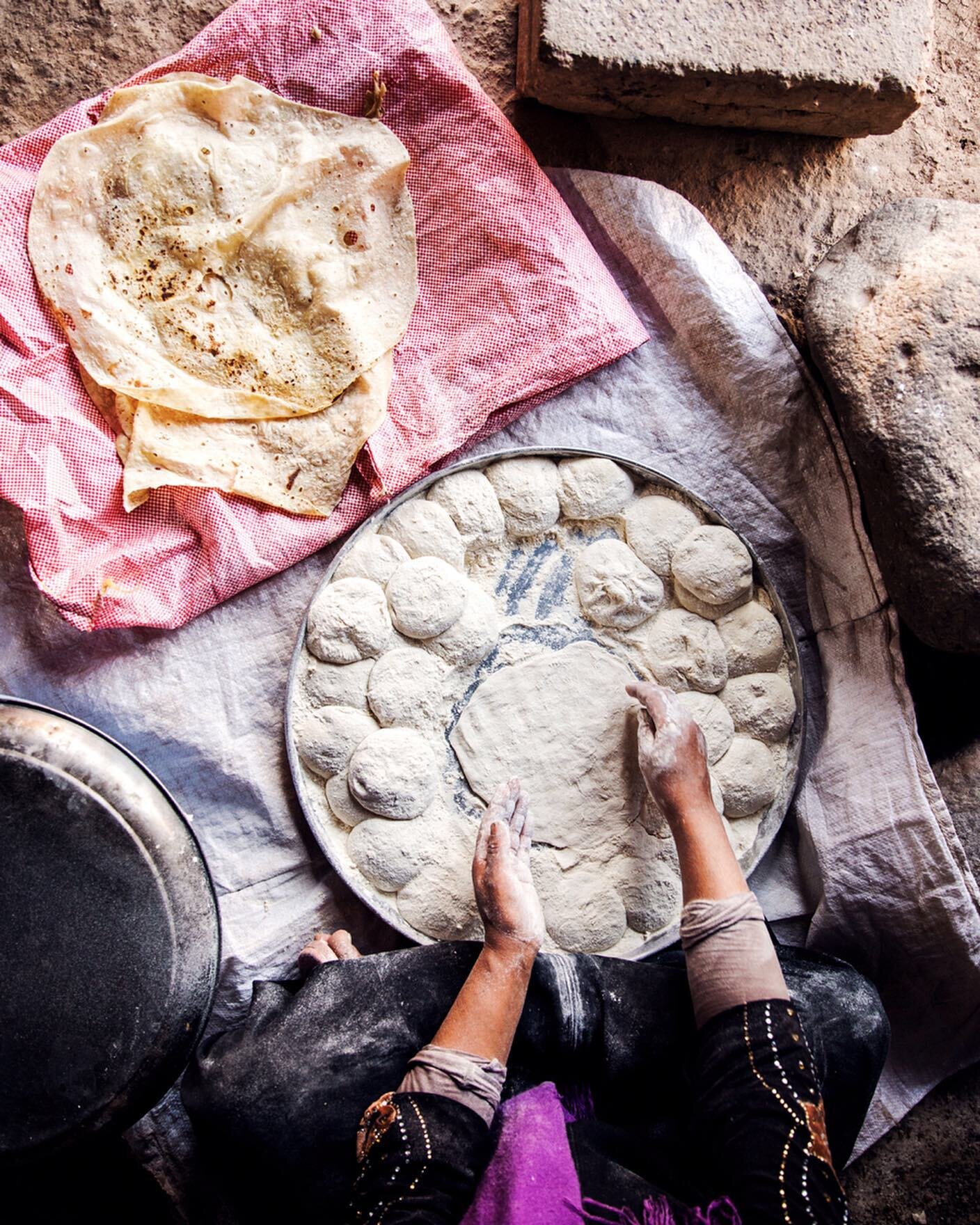 Revisited some archives of memorable meals I&rsquo;ve shared with strangers. Like baking shrak, a traditional Arabic bread with a Bedouin family in Jordan and feasting on mansaf in Wadi Rum for lunch; preparing pongala, a sweet porridge, with million