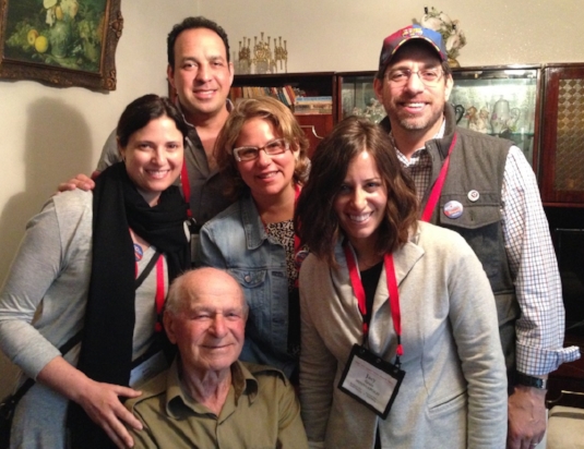 Visiting a homebound holocaust survivor in Romania.