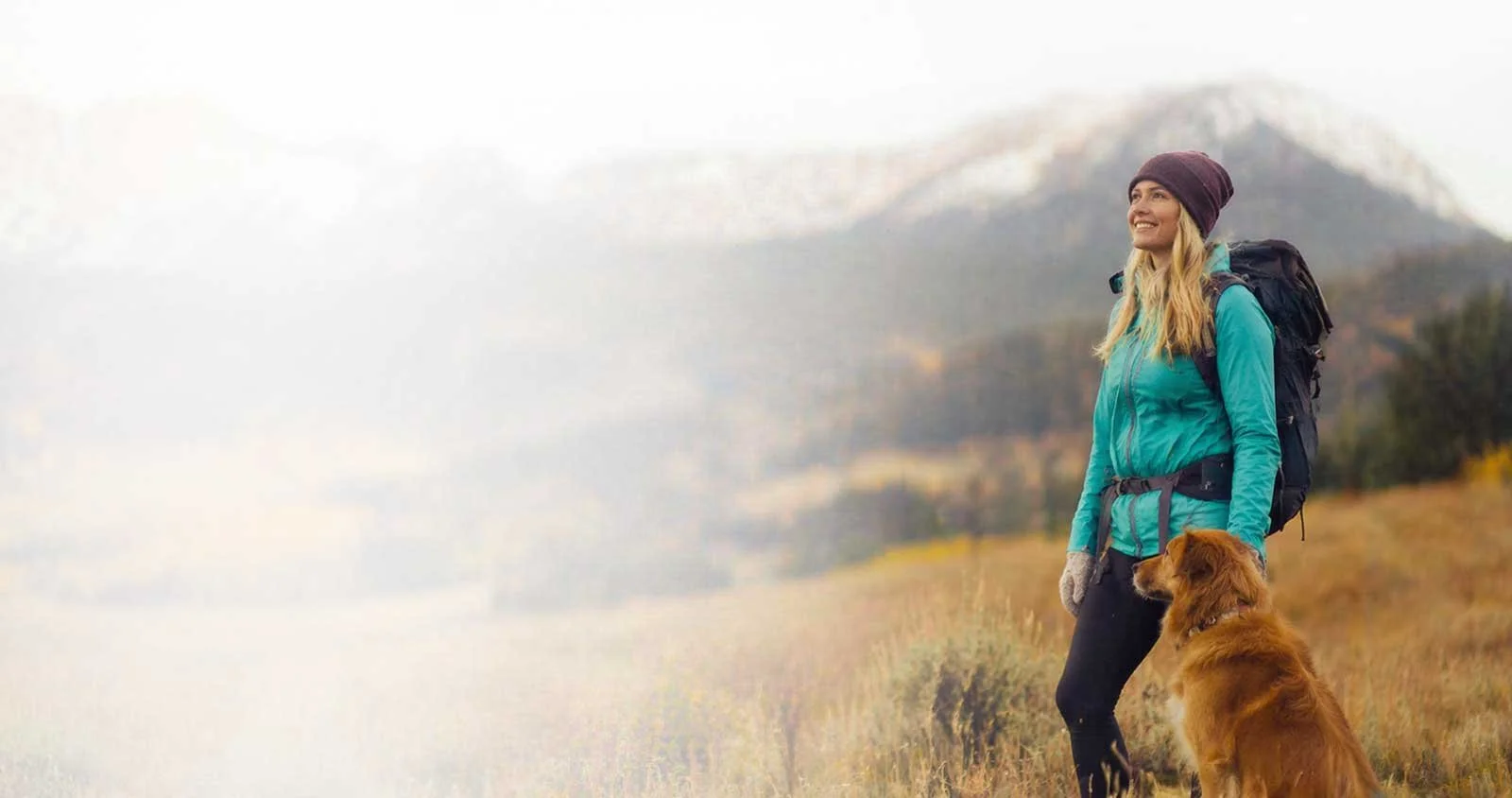Happy-hiker-and-dog-in-autumn-landscape-true-north-acupuncture-denver-3.jpg