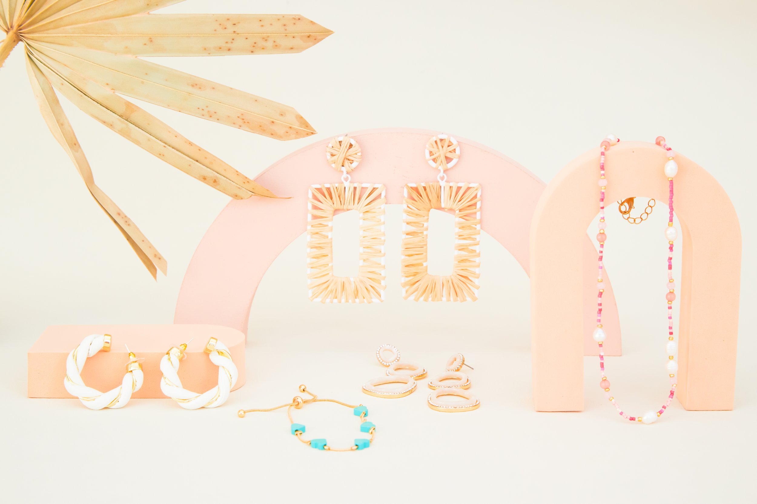 BIRDY GREY_HONEYMOON JEWELRY_HERO FLAT LAY_RT_16.jpg