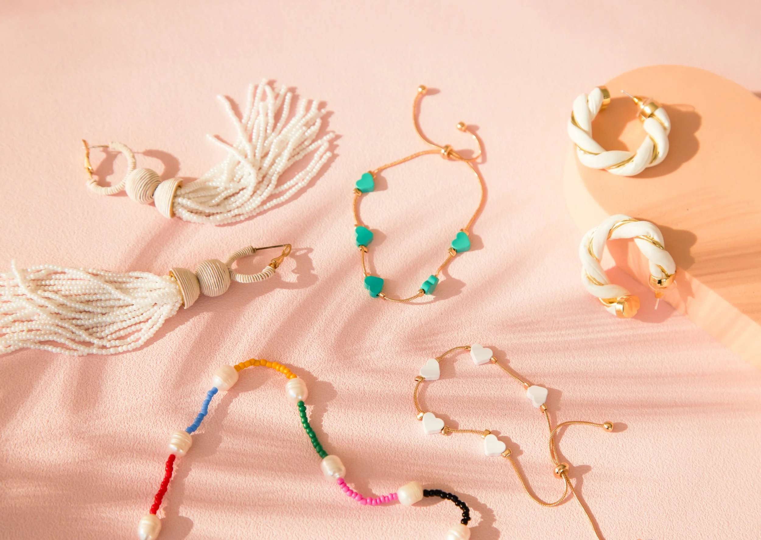 BIRDY GREY_HONEYMOON JEWELRY_HERO FLAT LAY_RT_17.jpg