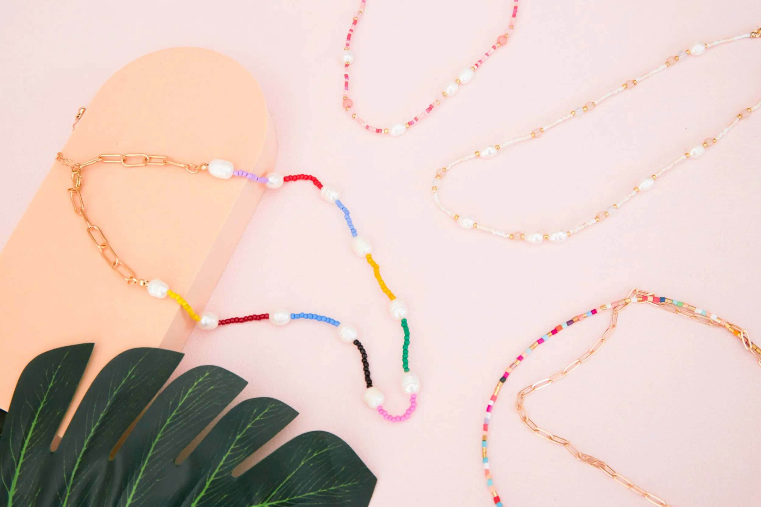 BIRDY GREY_HONEYMOON JEWELRY_HERO FLAT LAY_RT_12.jpg