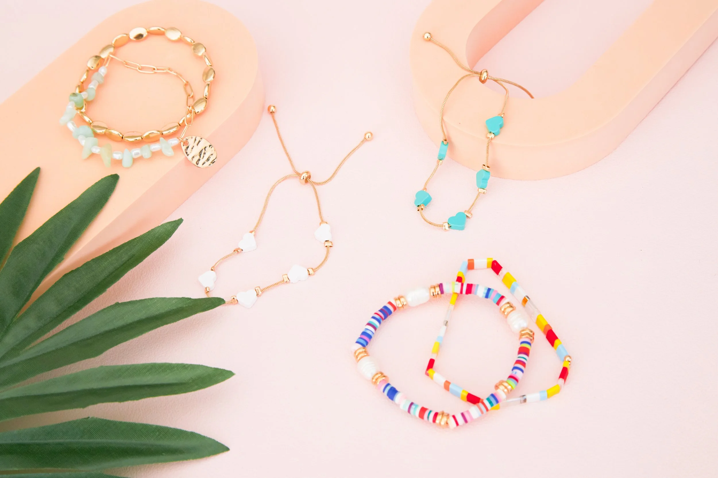 BIRDY GREY_HONEYMOON JEWELRY_HERO FLAT LAY_RT_08.jpg