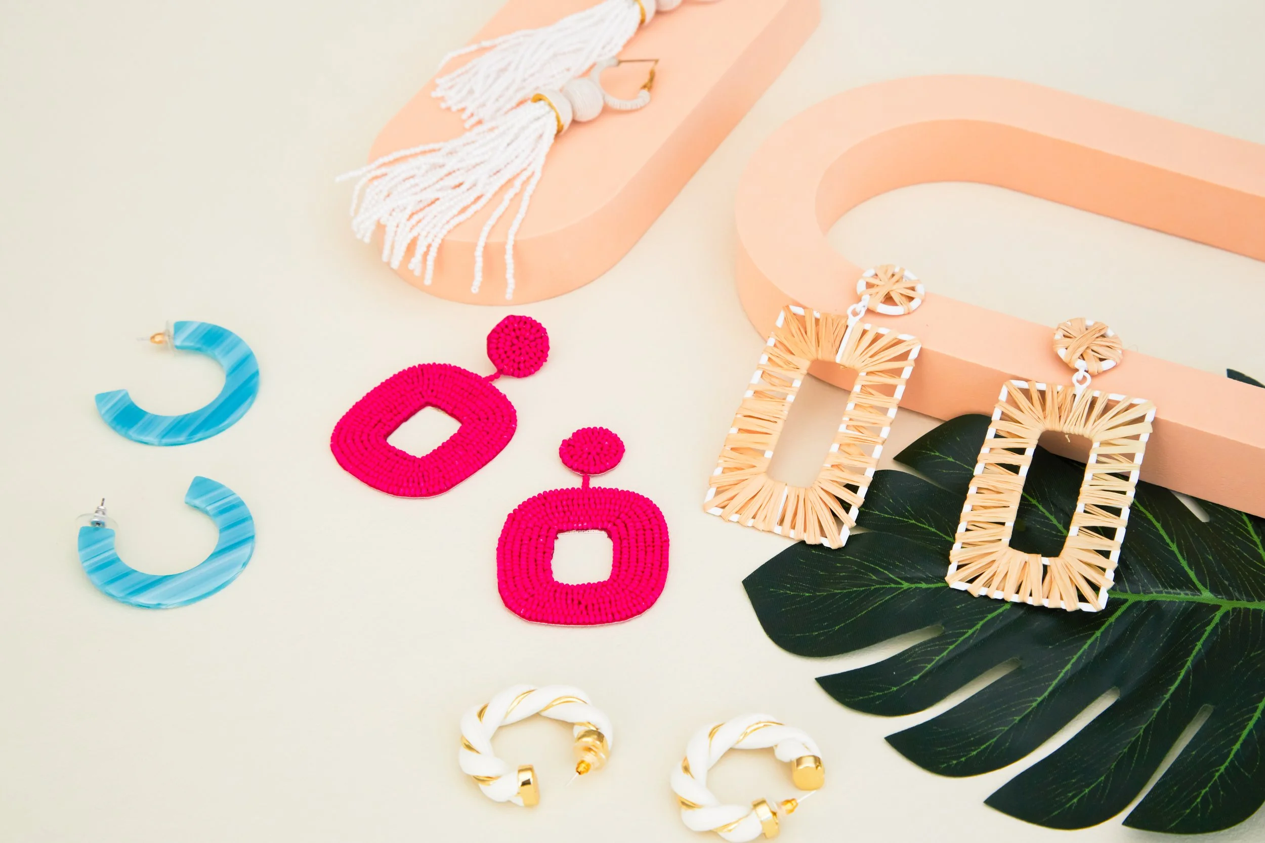 BIRDY GREY_HONEYMOON JEWELRY_HERO FLAT LAY_RT_06.jpg