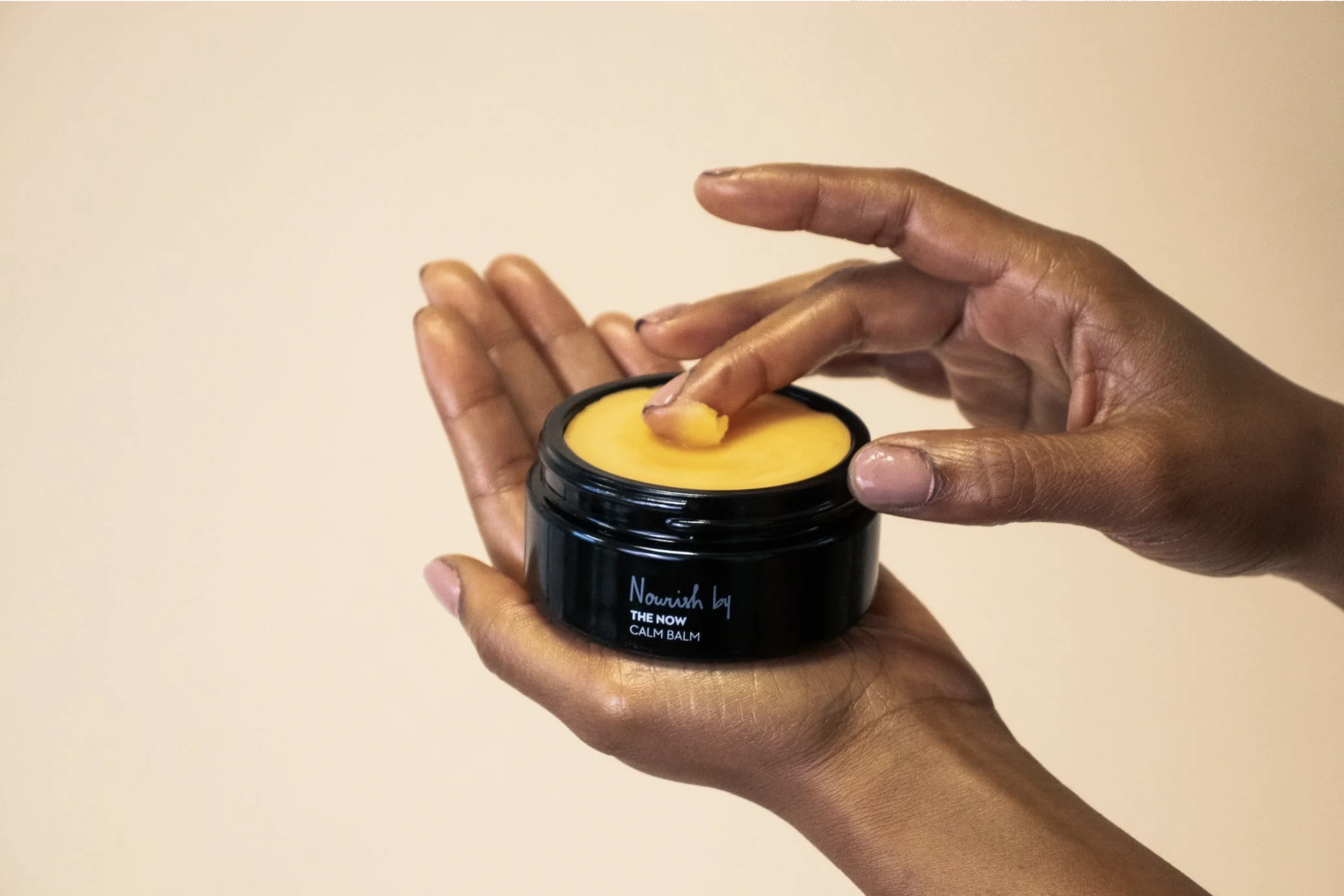 The NOW Calm Balm with Model