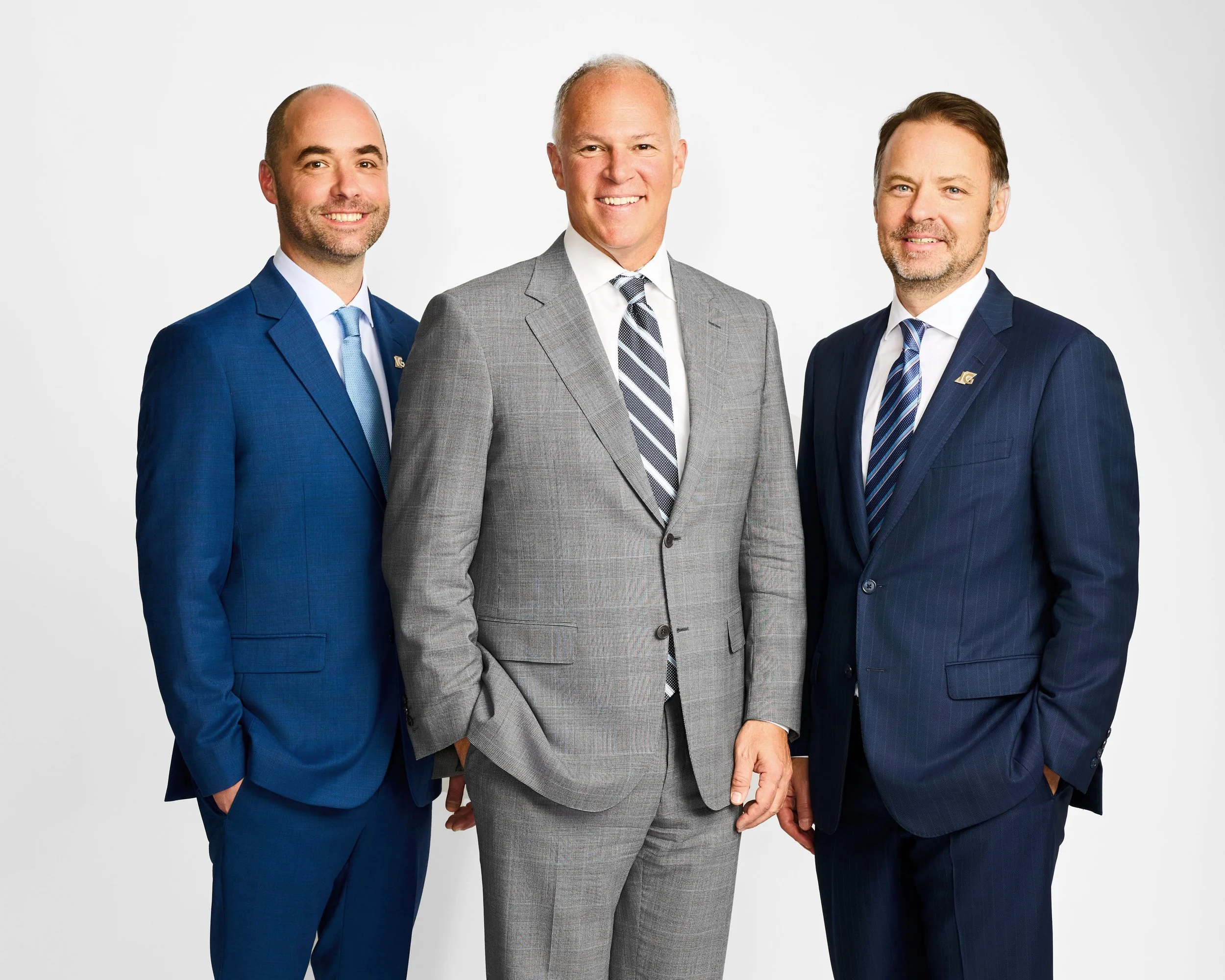 A group of professional male executives during an on-location corporate team headshot session in Toronto.