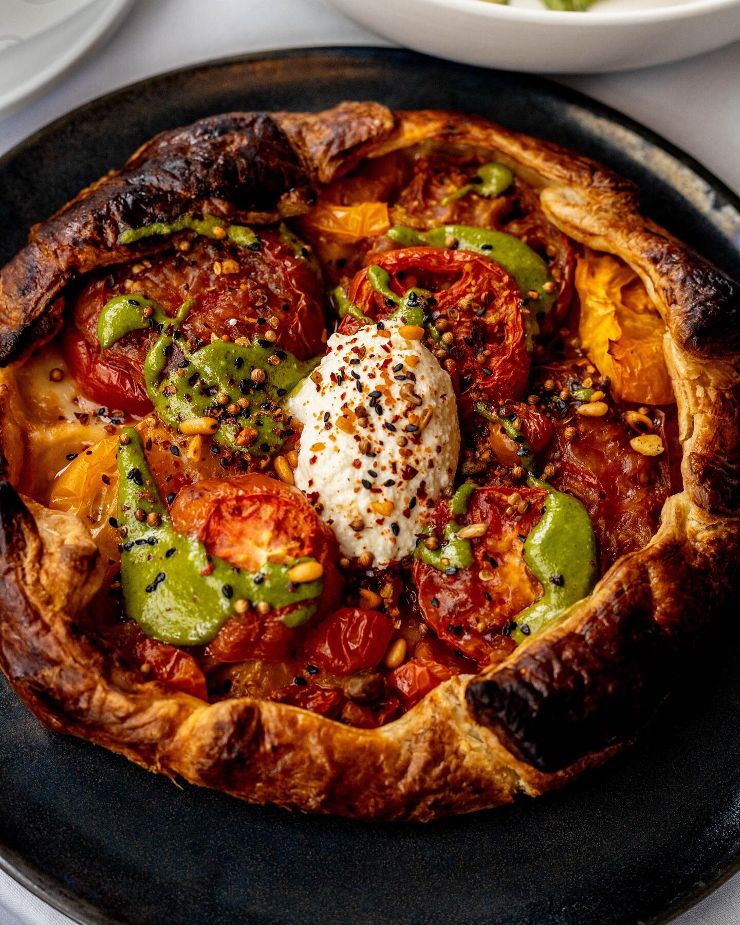 The beauty of summer is in its brief bounty in New England&hellip; celebrating the tomatoes with every last ditch effort possible! Dive in to the tomato galette with @longtablefarmct magic