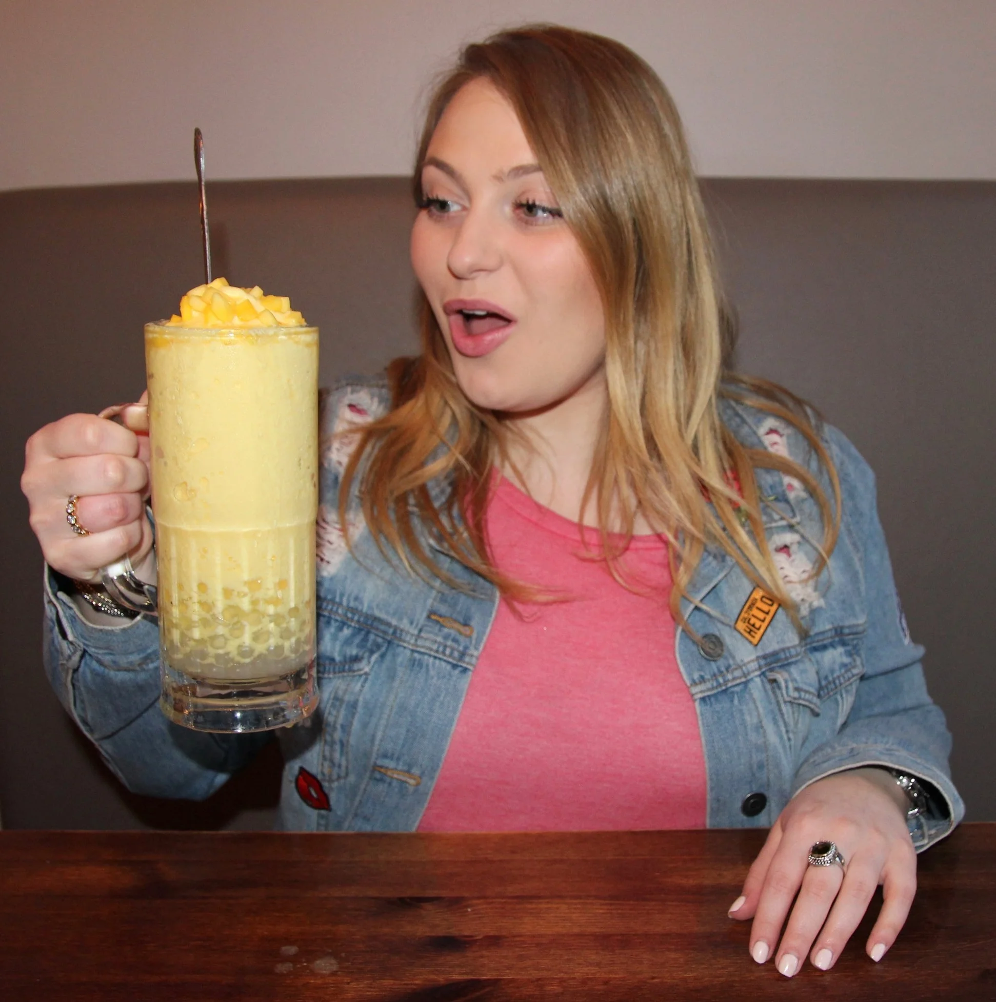 Mango milkshake, fresh orange juice, mango puree, yogurt pops (on the bottom), and fresh mango on top!