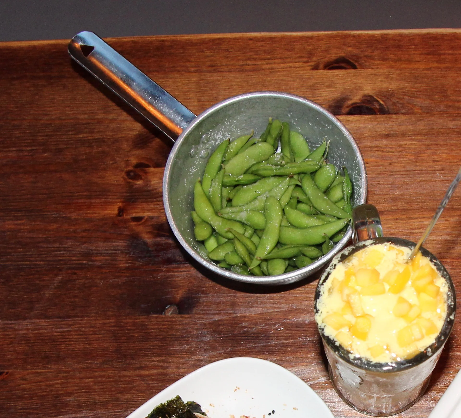 Salted Edamame (with the very mango milkshake to the right)