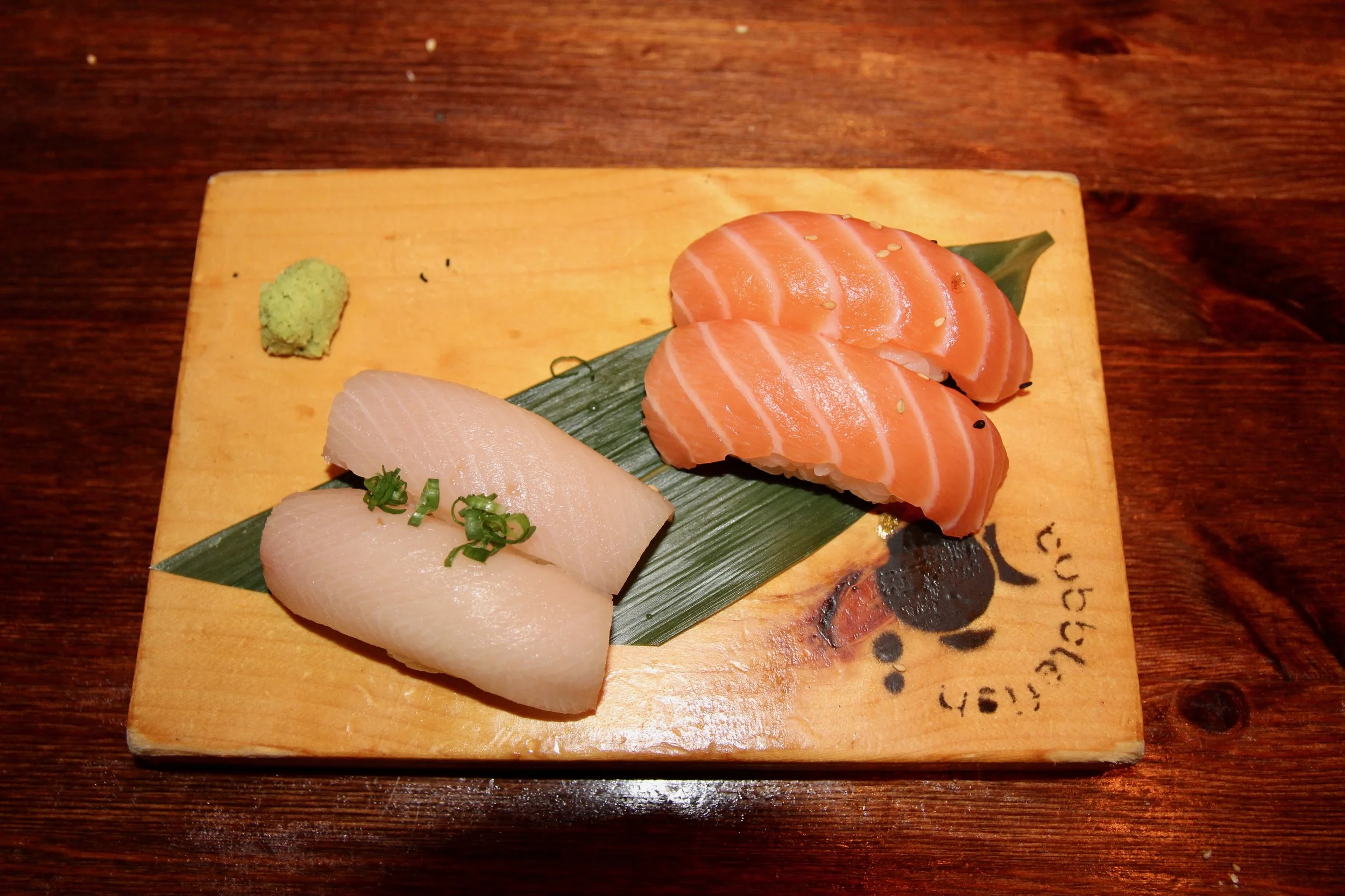 Yellowtail sushi (left) Salmon sushi (right)