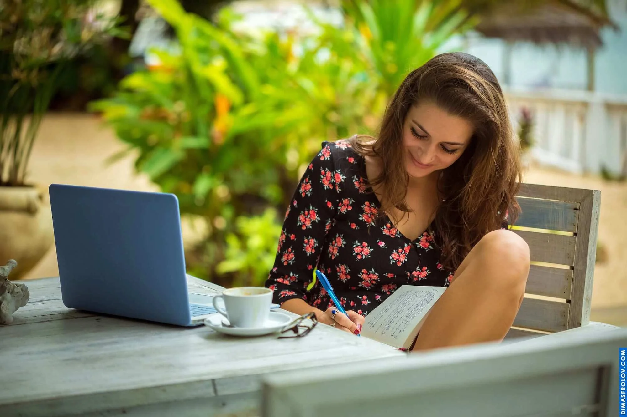 A woman writing in her journal