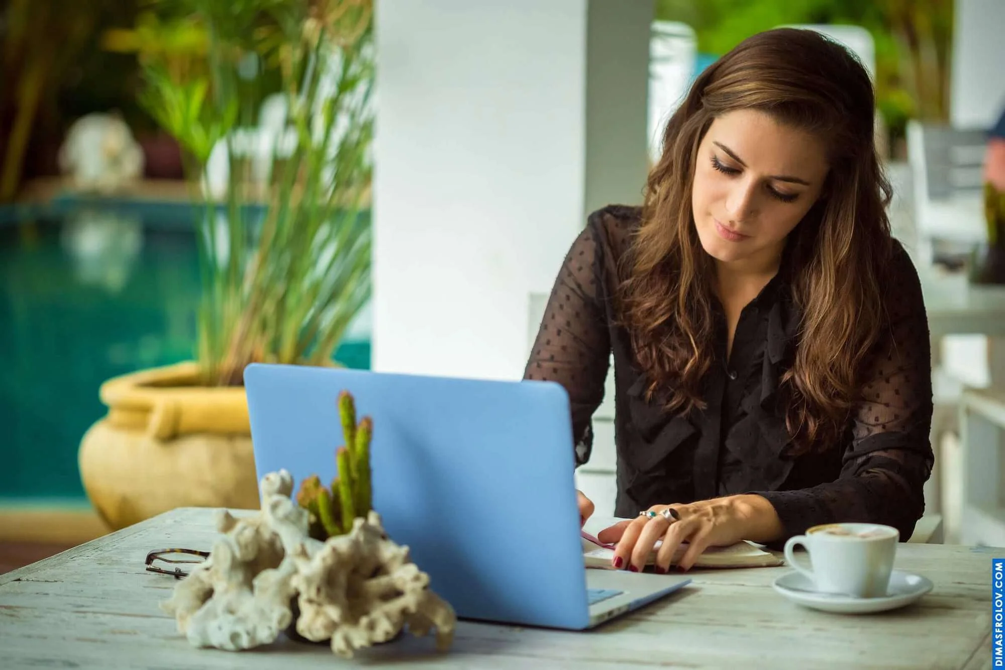A woman typing on her computer