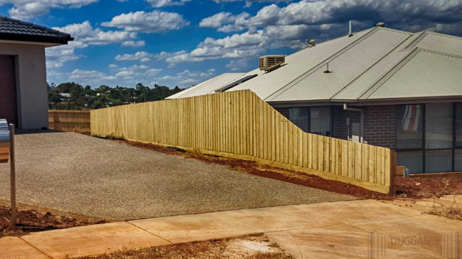 Mixed height Timber Fence