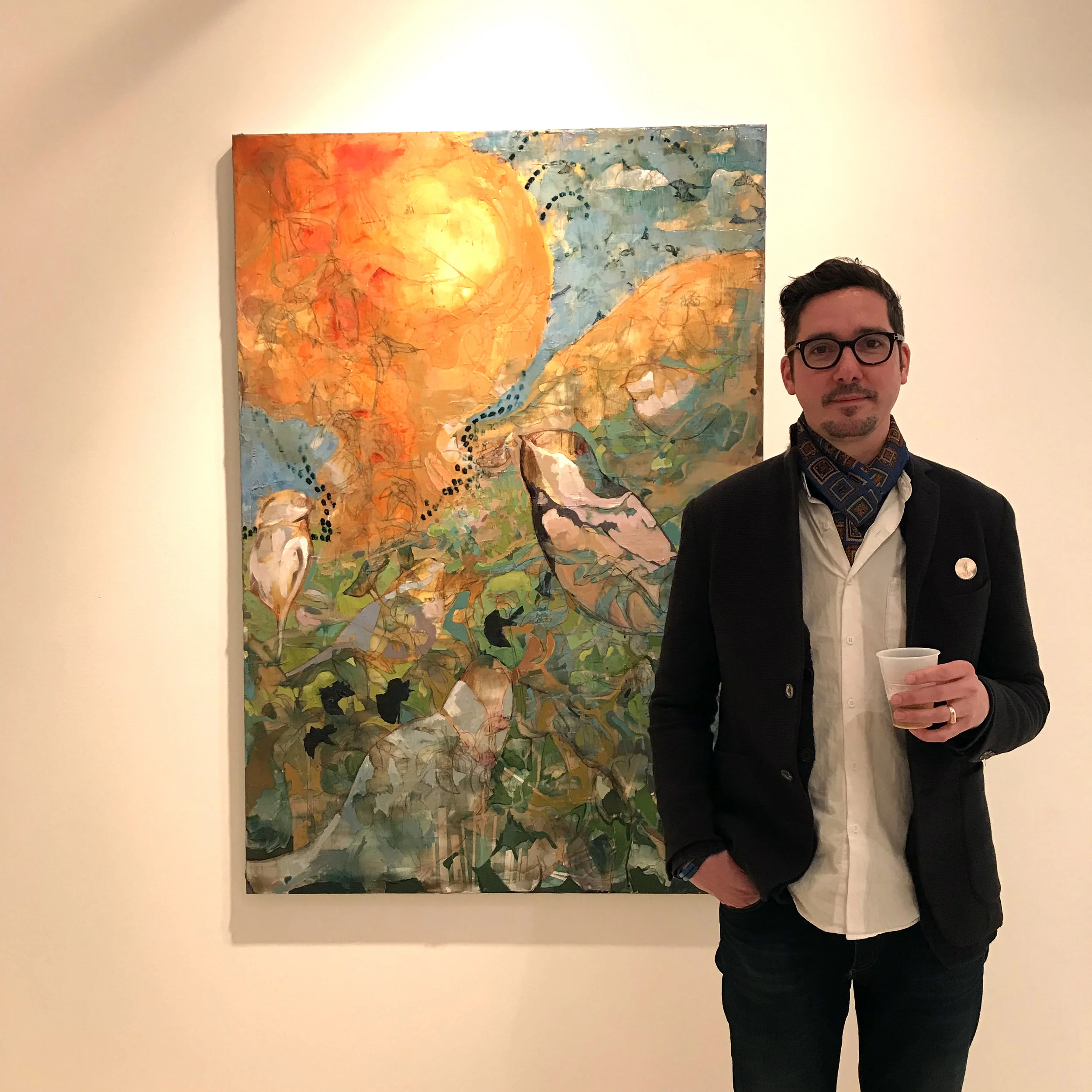 Artist David Hansen with his oil painting