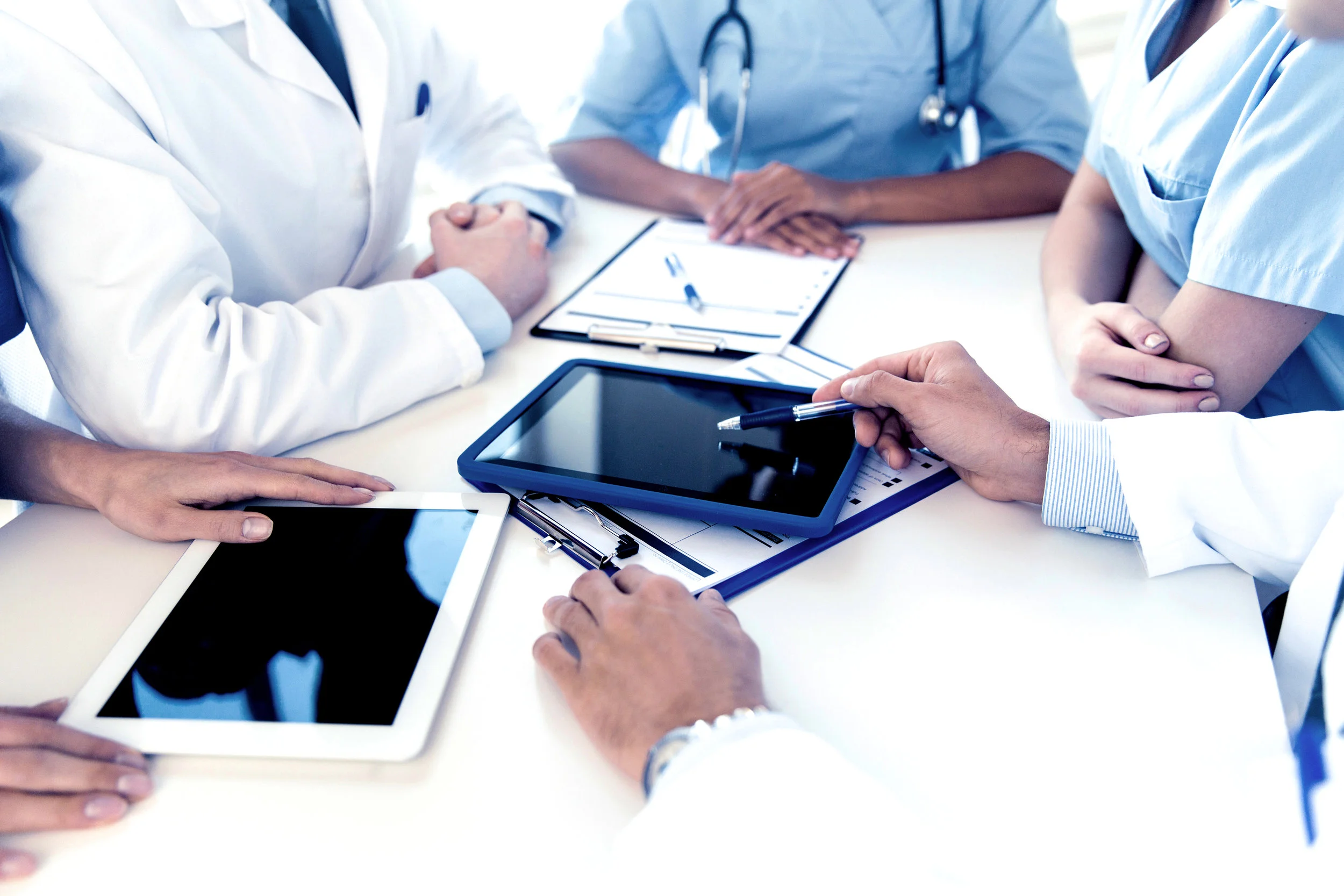 group-of-doctors-meeting-at-hospital-office-PQATT5L.jpg