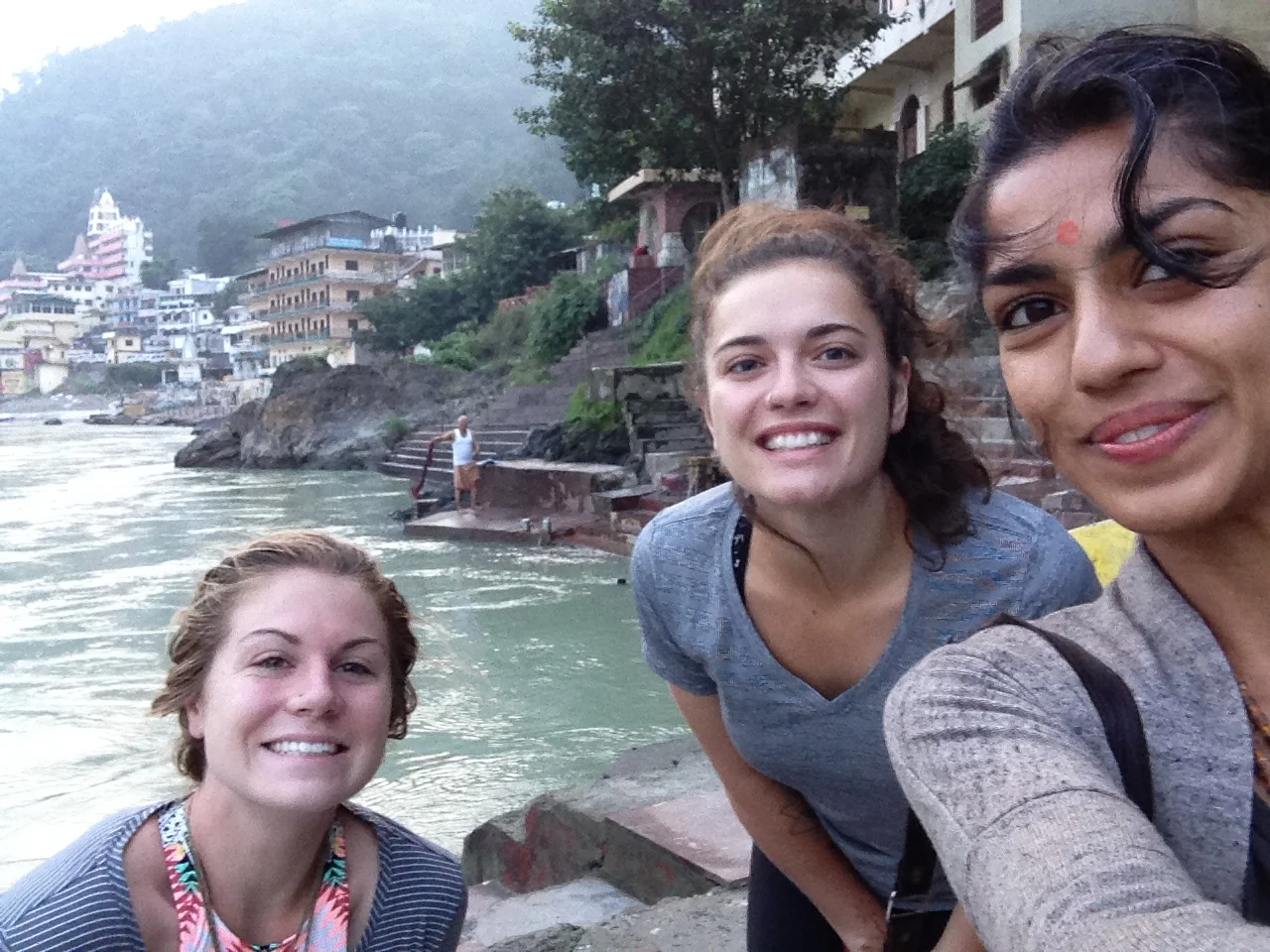 kim (who was in the other stream of the august intake), myself and jal down at the river ganga at sunrise for an early morning dip - wE hadn't plunged in at this point, whch is why we're looking a bit weary!