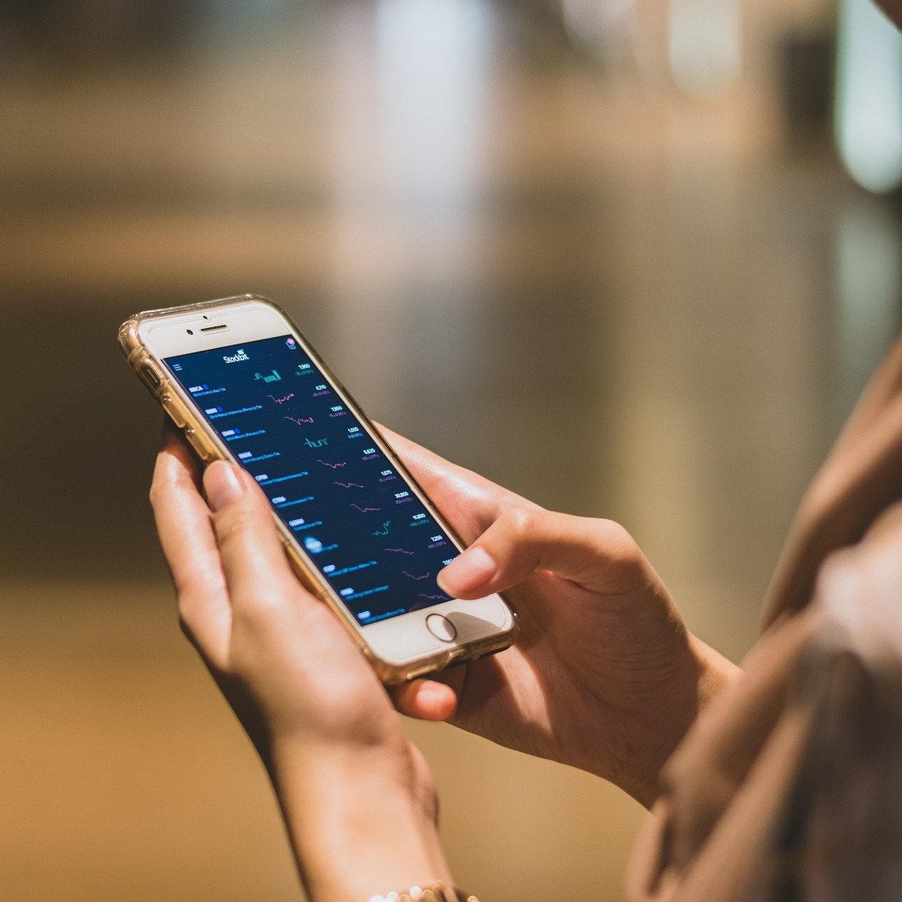 person using a phone to access apps