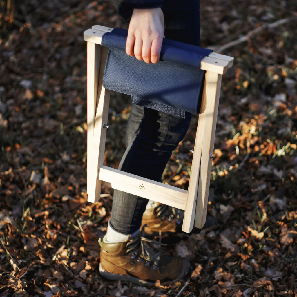 Folding stool, folded.