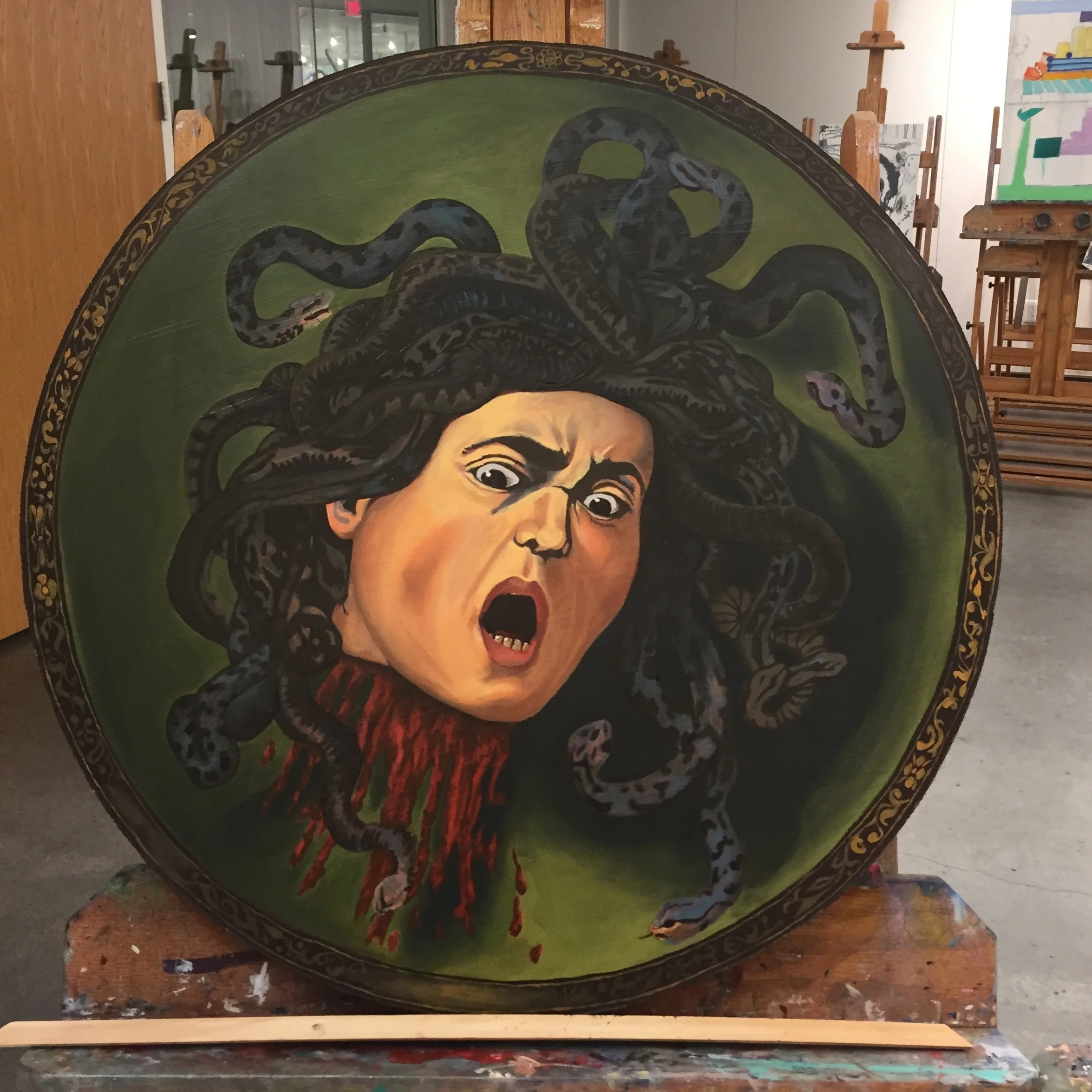 Almost done!  Lots of scumbling on the face and snakes