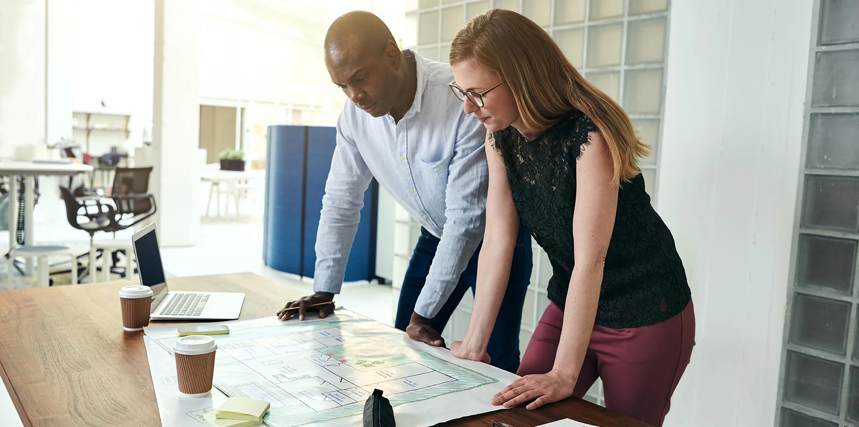two-architects-discussing-a-smart-building-design.jpg