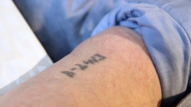 _108108436_samlaskier'stattoo.jpg
