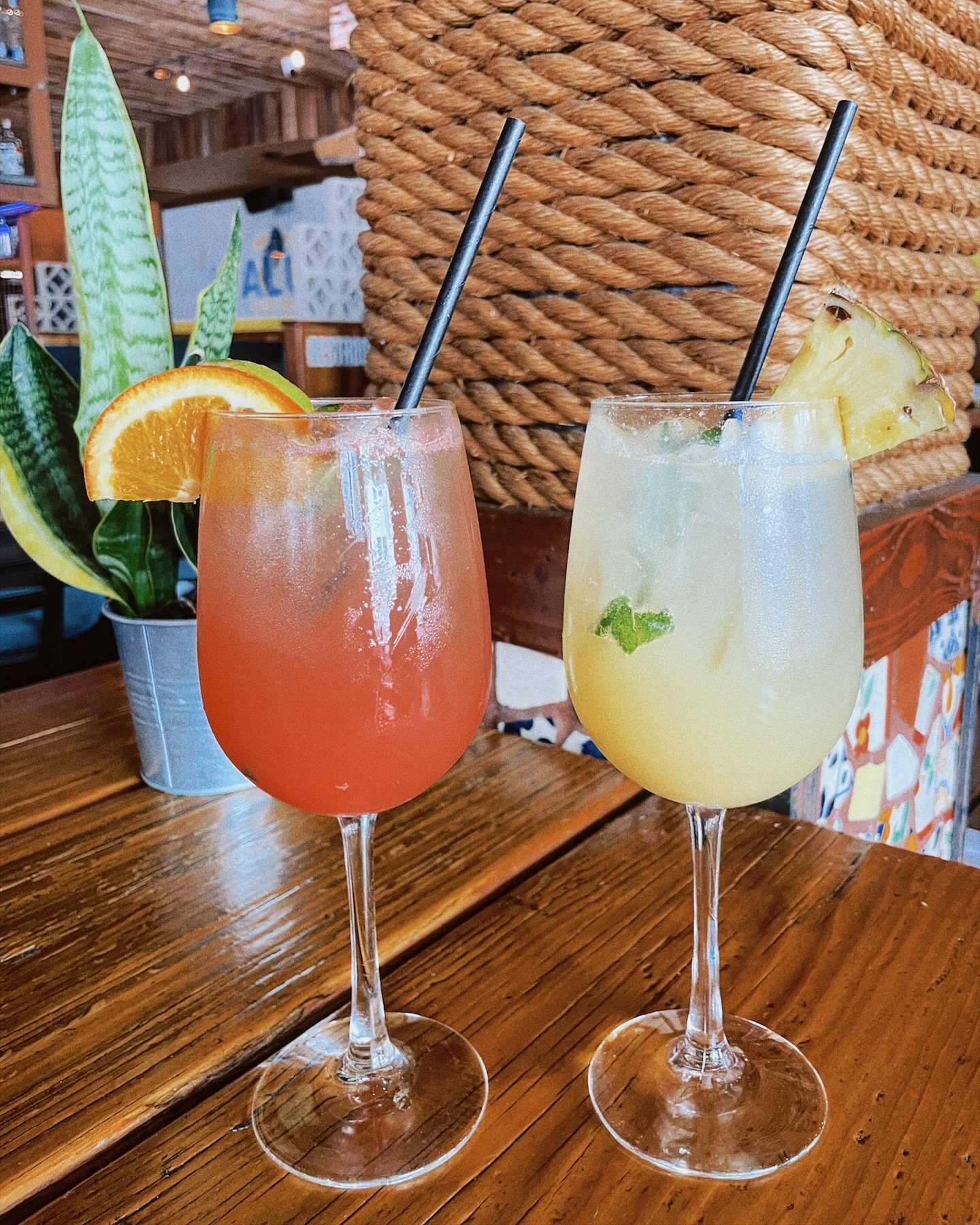 Making mocktails.🍹Try the Prickly Pear Limeade or the Pineapple Smash! 

🍐 Prickly Pear Limeade: prickly pear, lime, agave, cinnamon
🍍Pineapple Smash: pineapple pur&eacute;e, basil leaves, lime, agave