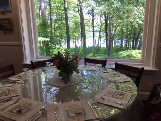 Table Setting for the 2017 Gala overlooking scenic Lake Cochichewick at the historic Rolling Ridge.