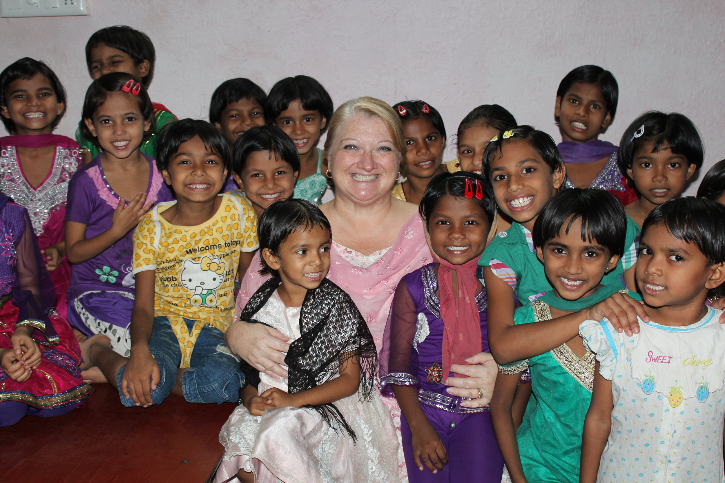 Kim with the girls of our orphanage - Copy.JPG