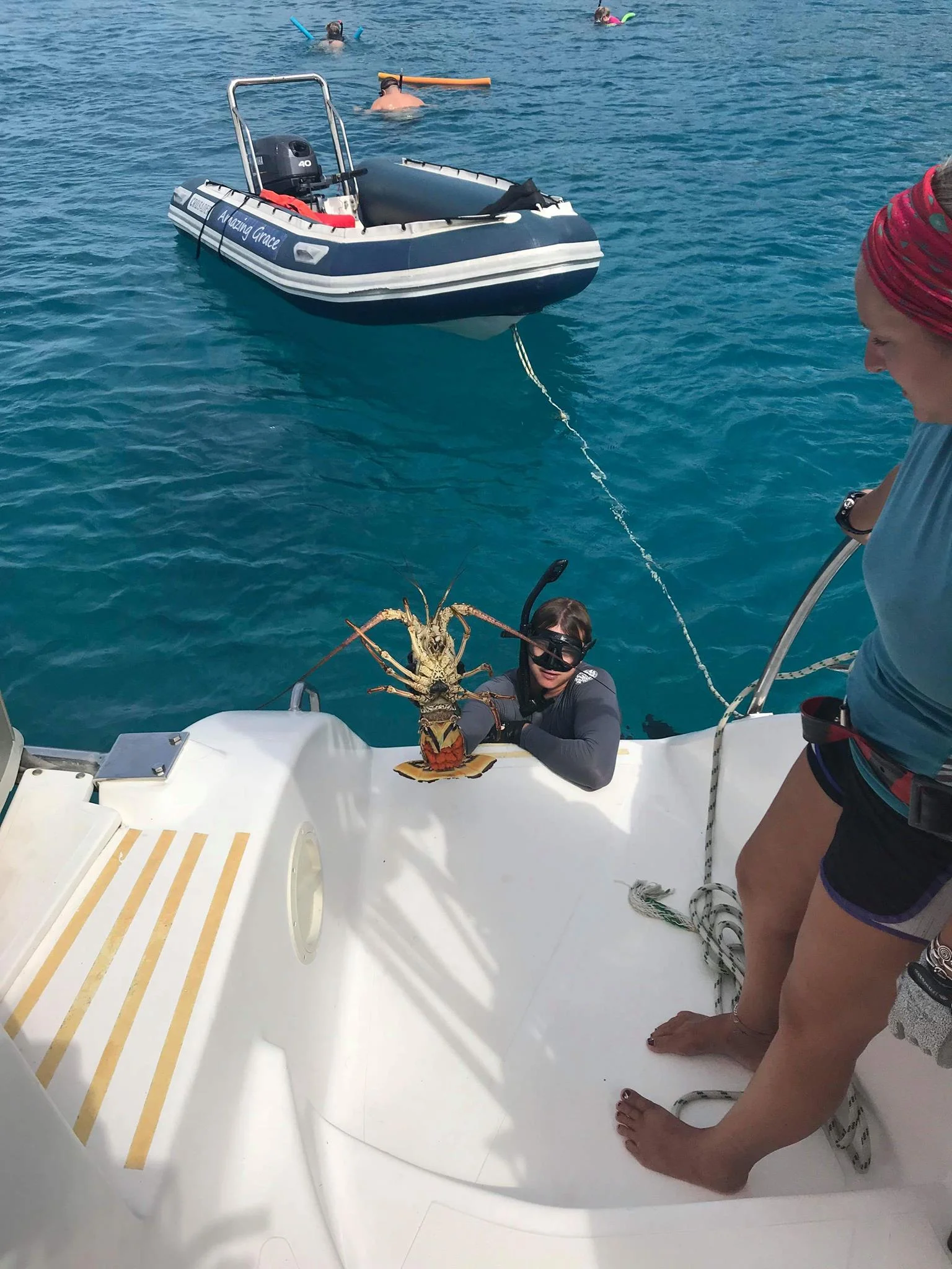 Captain Mark of Amazing Grace catching dinner! Virgin Gorda- April 2018