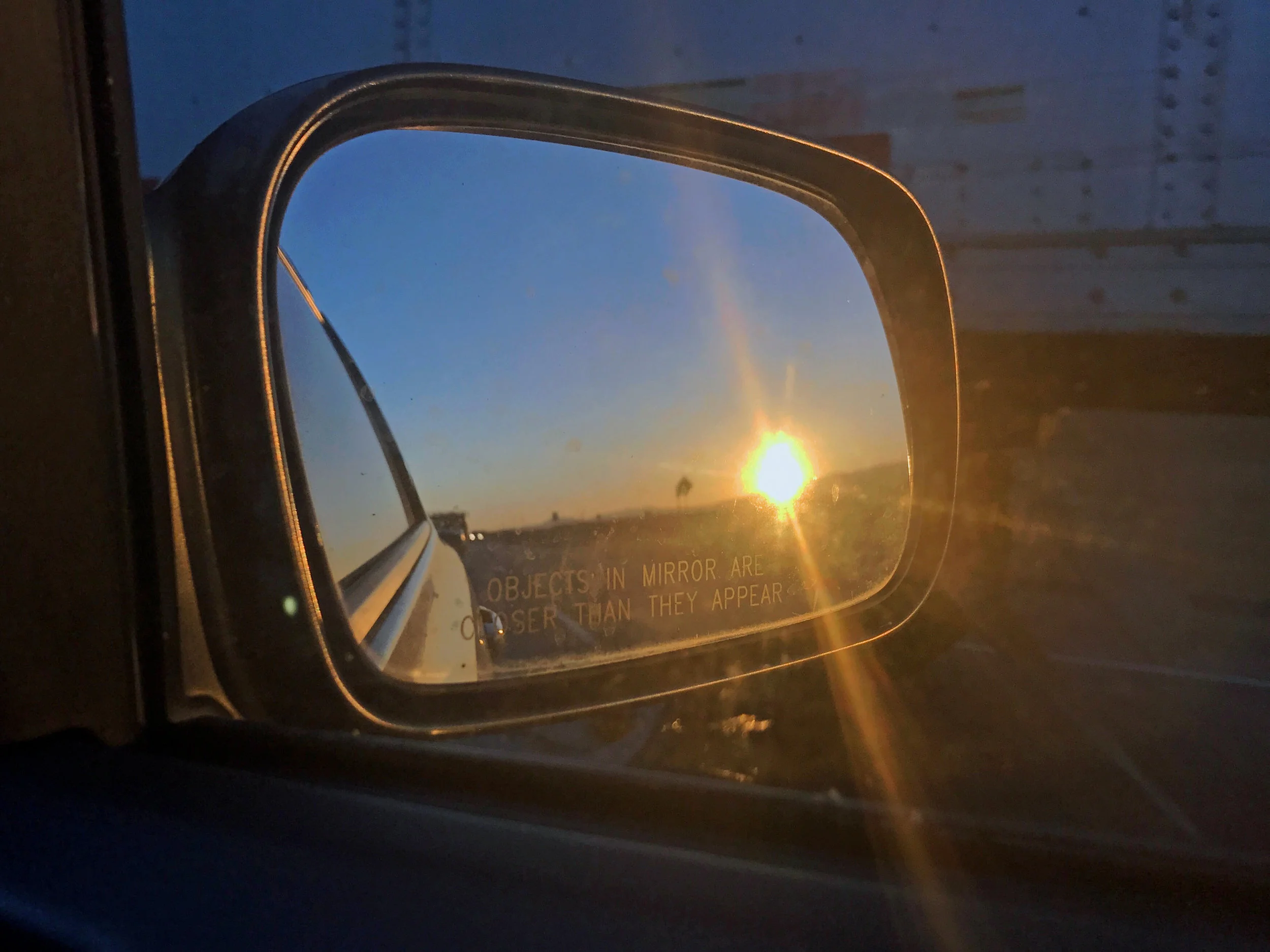 California Sunrise in the side mirror