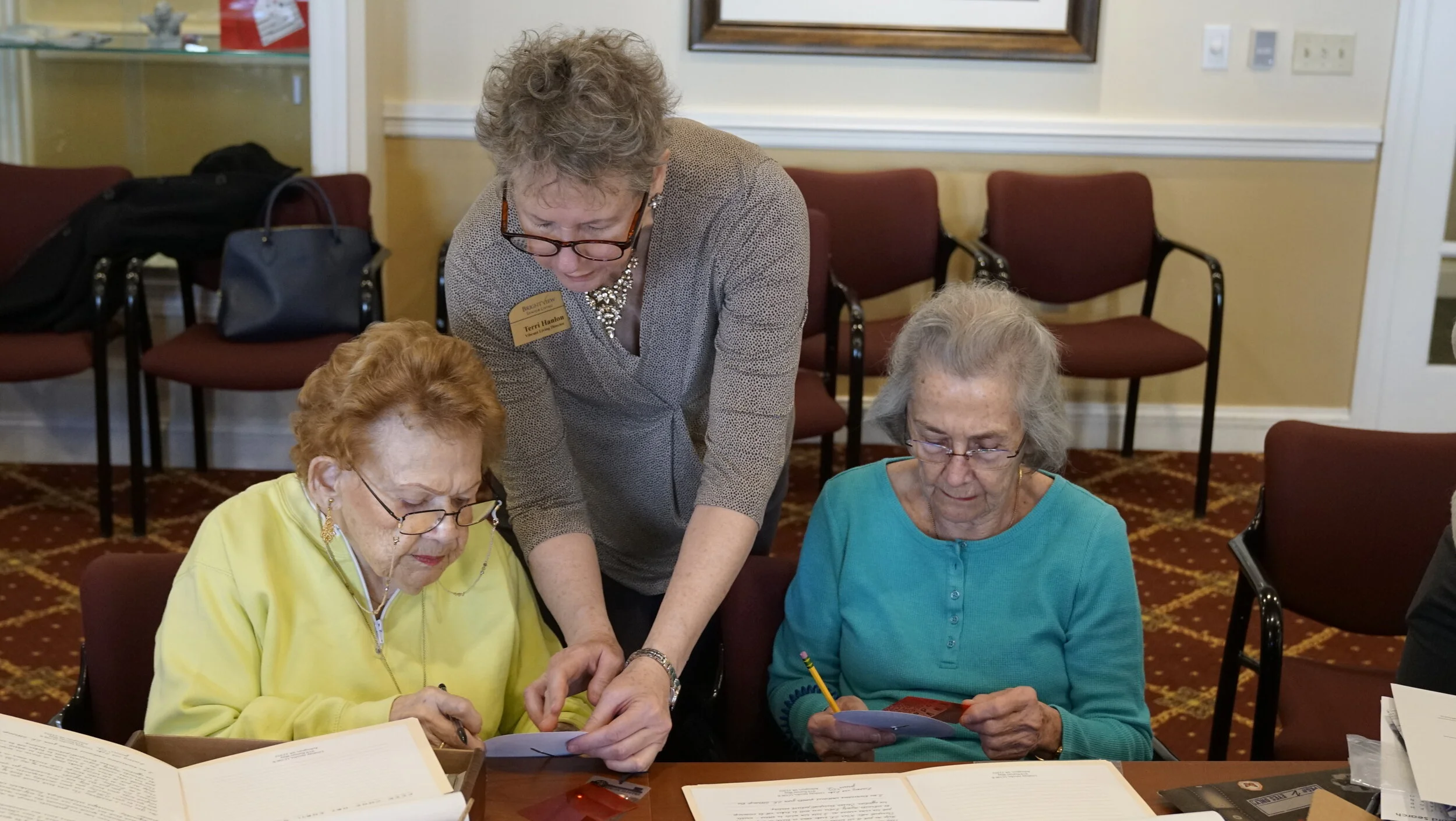 seniors working on senior sleuth box