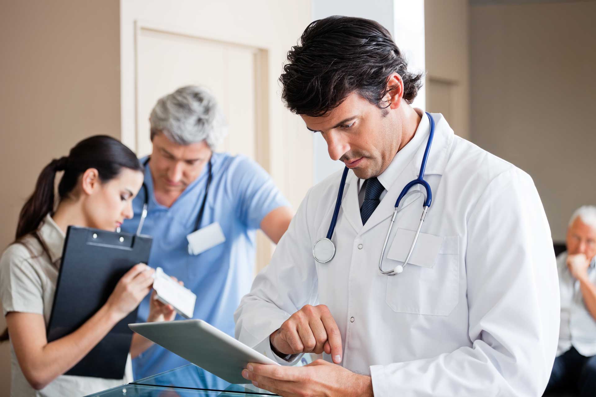doctor-looking-intently-at-a-chart.jpg